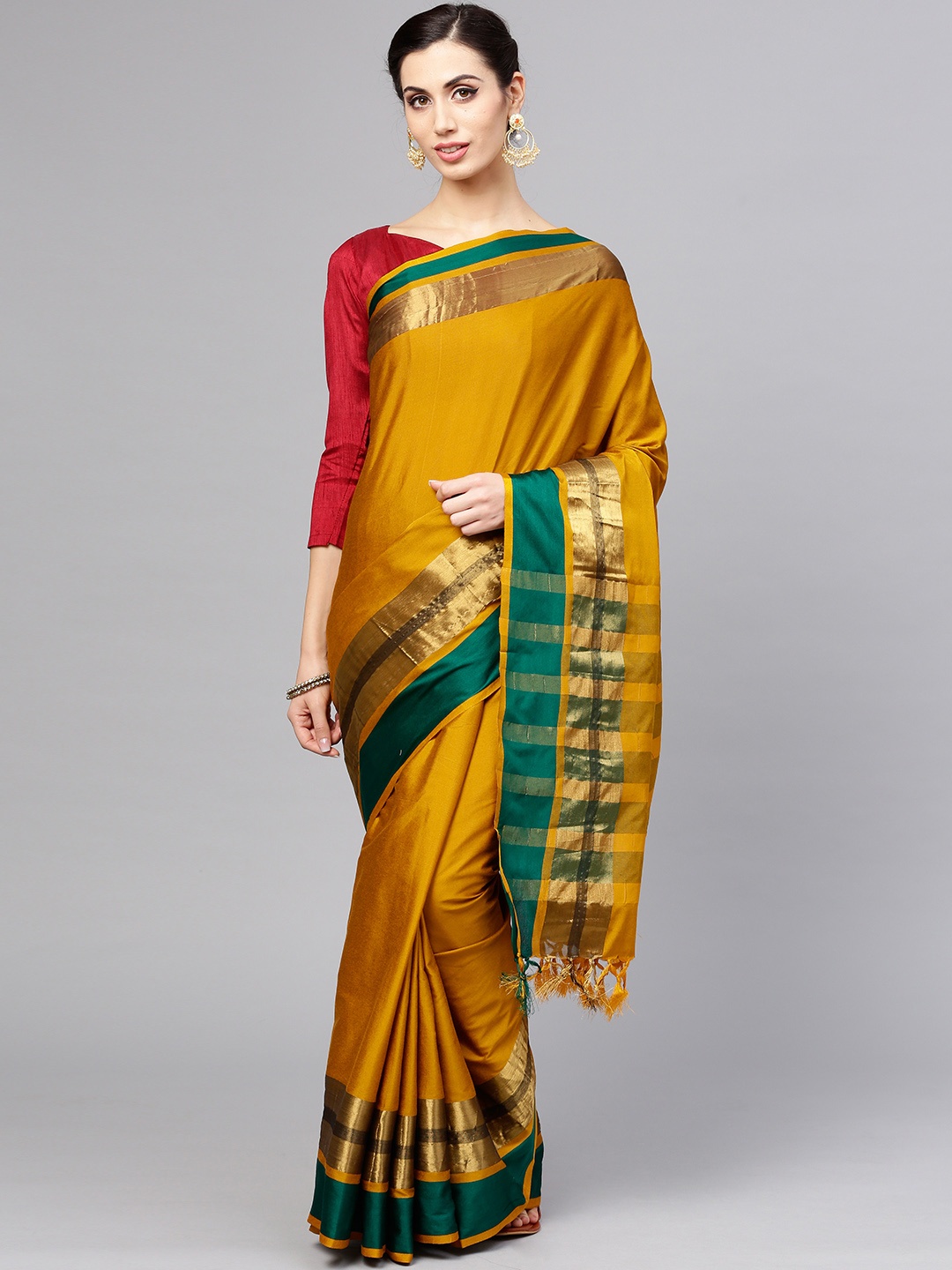 

Saree mall Mustard Yellow Solid Saree