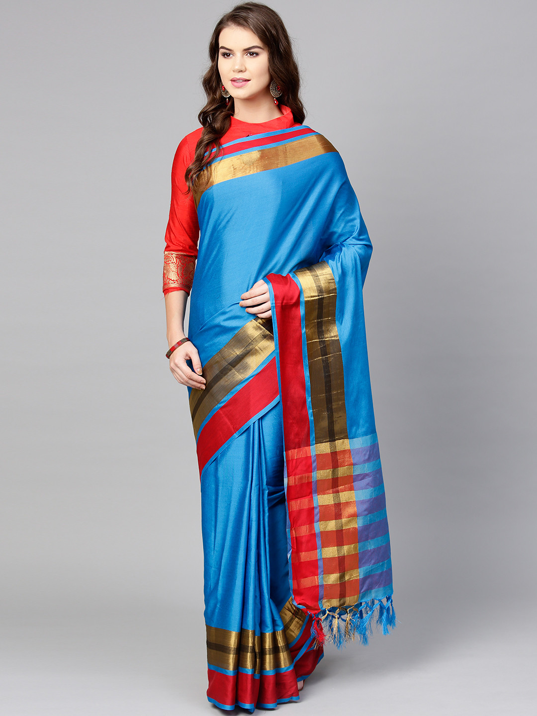 

Saree mall Blue & Red Solid Saree