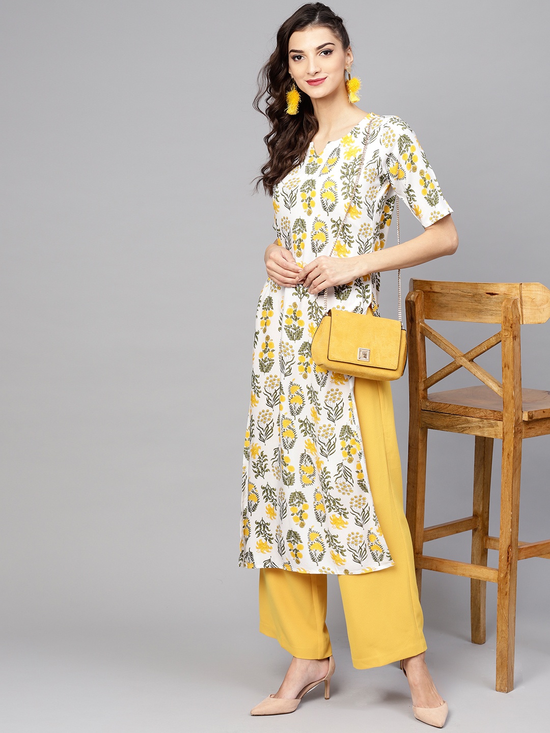 

Libas Women White & Yellow Printed Straight Kurta
