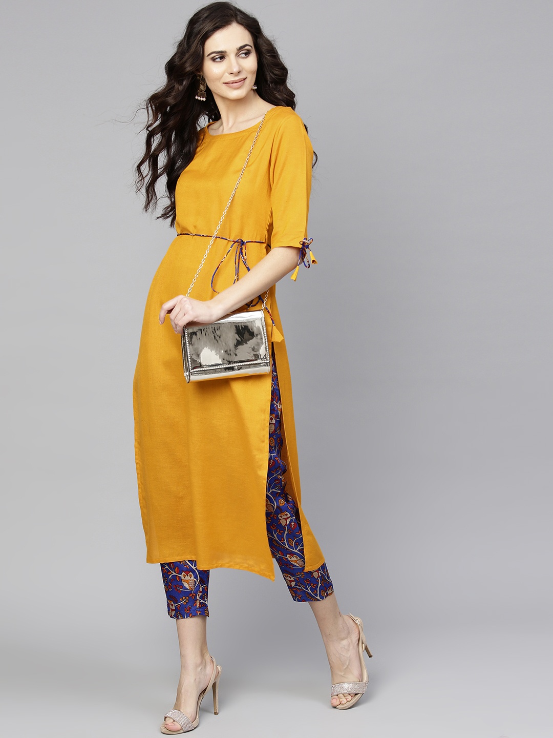 

Libas Women Mustard Yellow & Blue Solid Kurta with Trousers