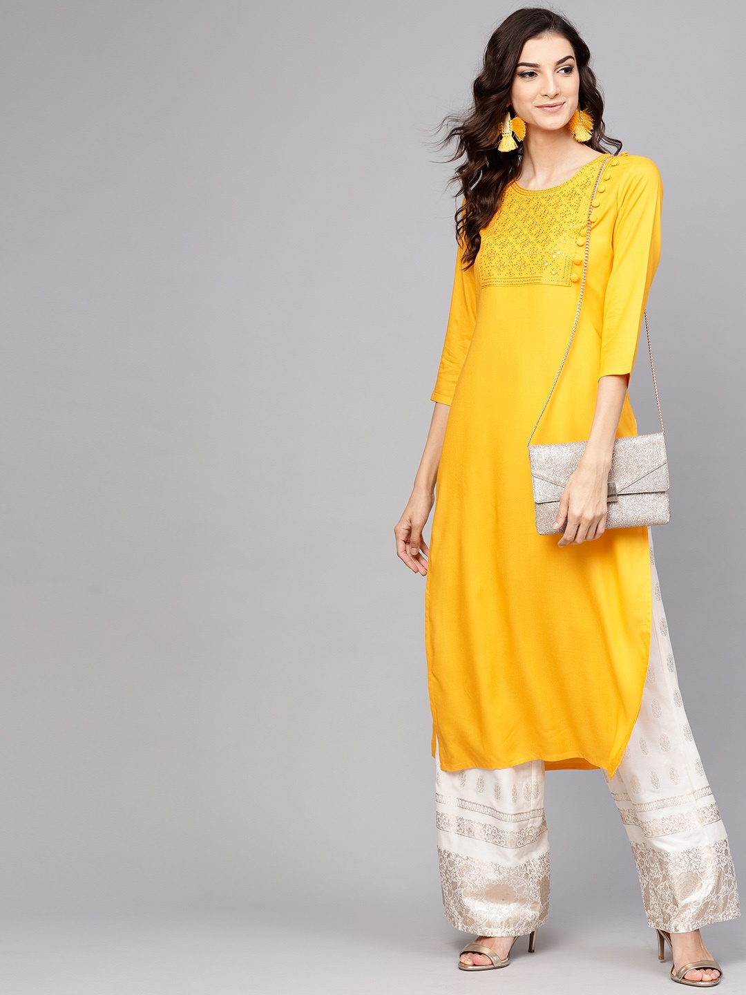 

Libas Women Yellow Yoke Design Straight Kurta