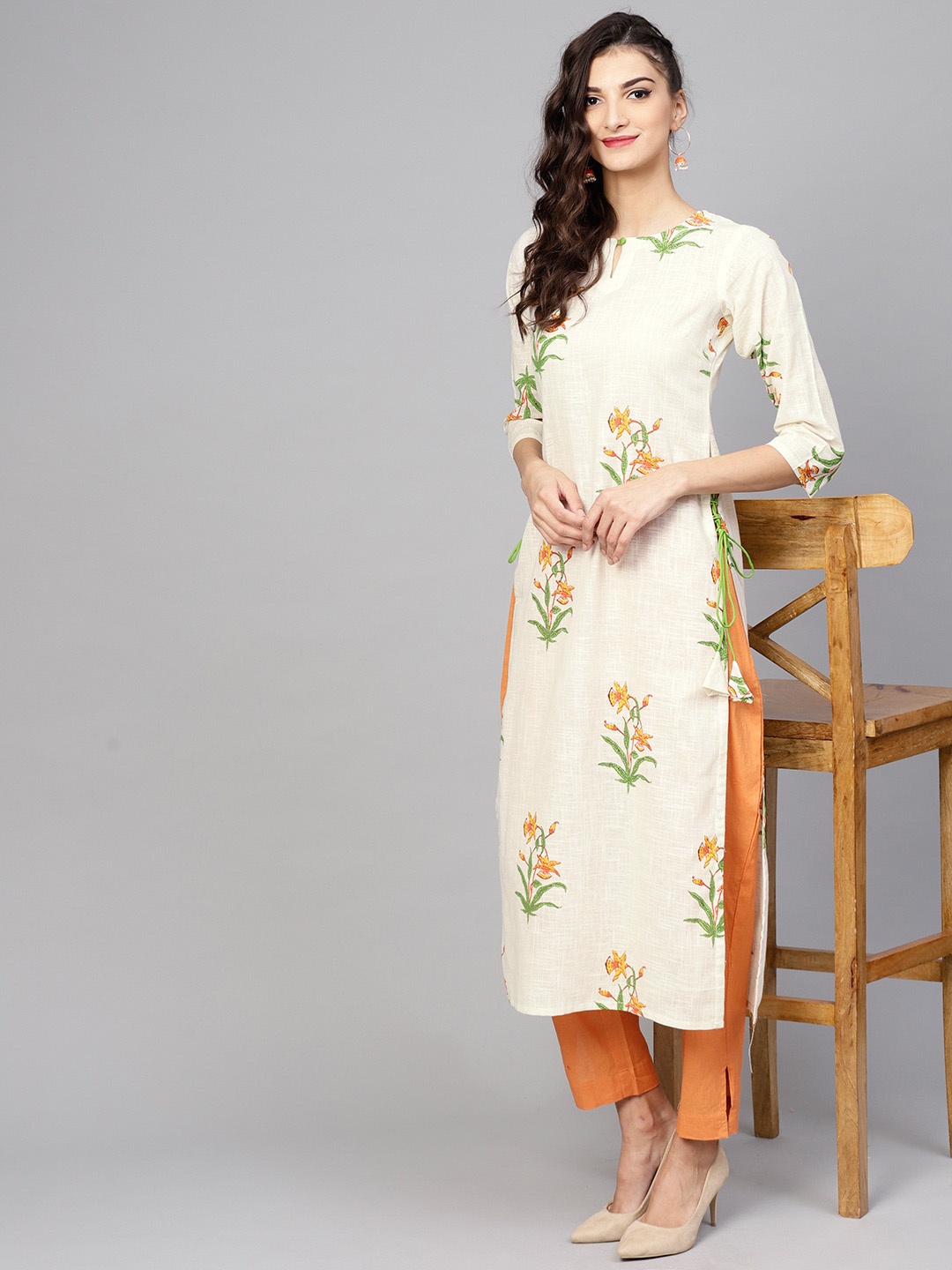 

Libas Women Off-White & Yellow Printed Straight Kurta