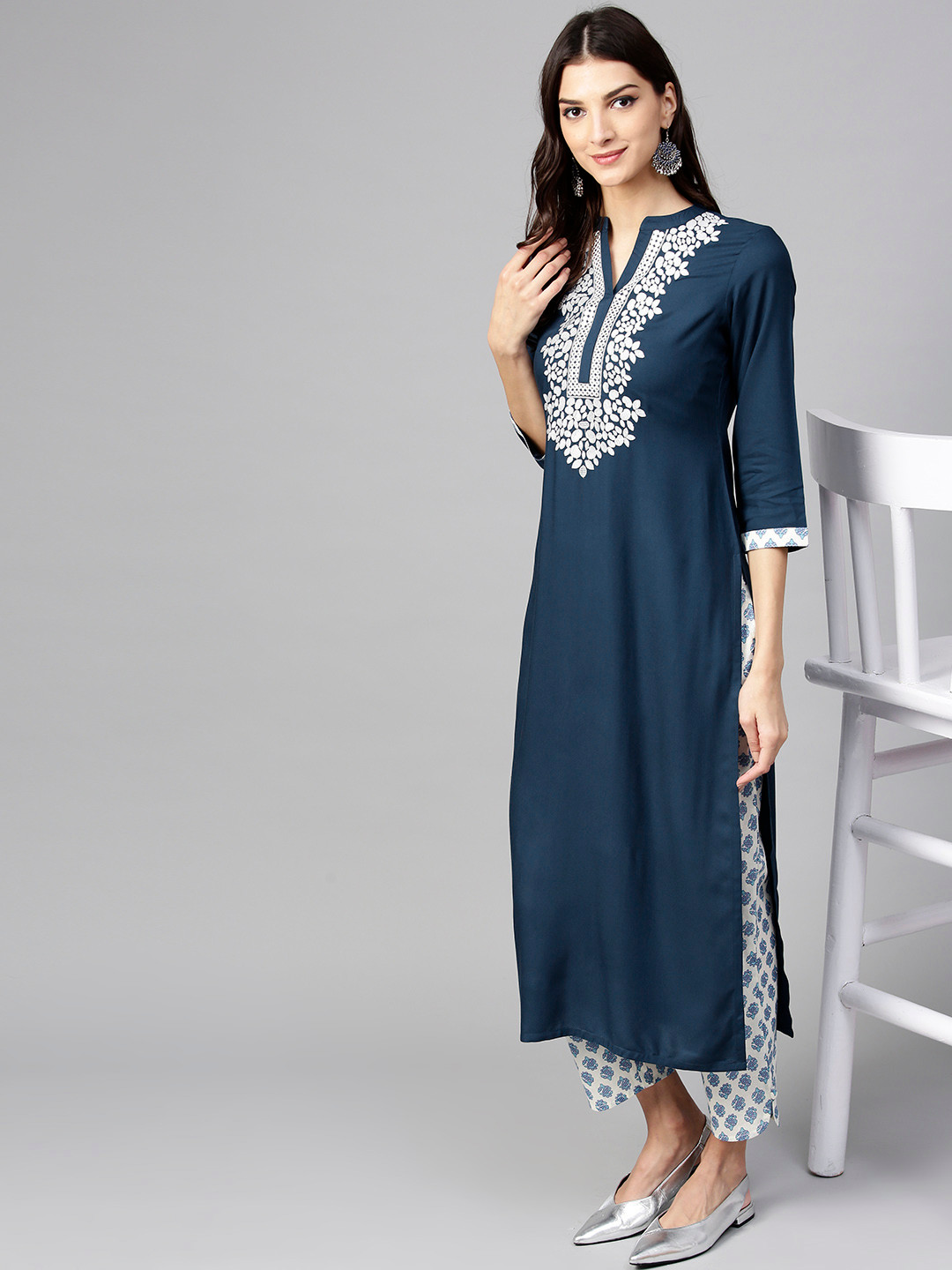 

Libas Women Teal Blue Yoke Design Kurta with Trousers