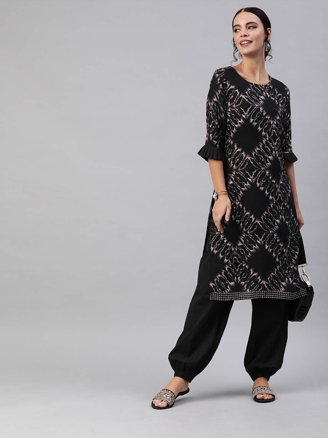 

AKS Women Black & Grey Discharge Printed Kurta with Salwar With Bell Sleeves