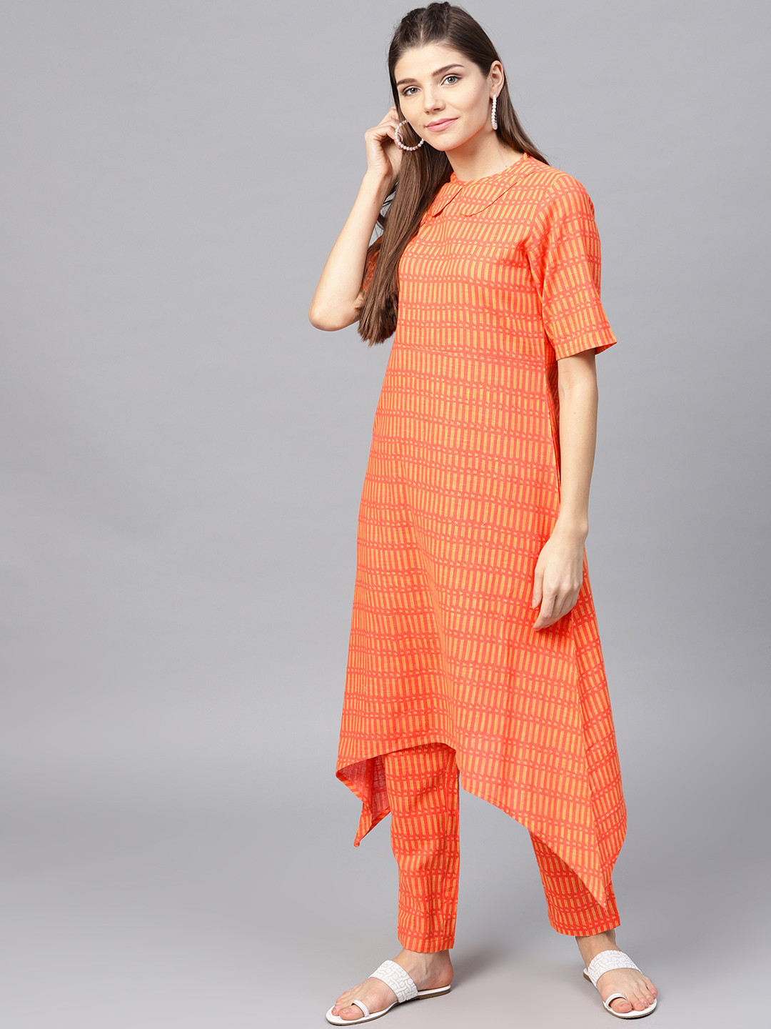 

aasi Women Peach-Coloured & Yellow Printed Kurta with Trousers