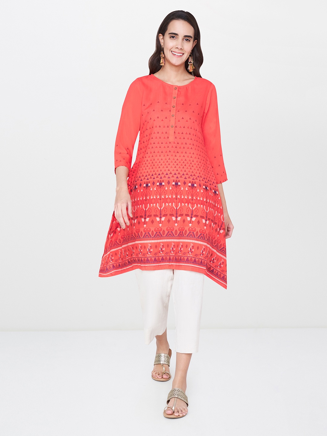 

Global Desi Women Coral Pink Printed Asymmetric A-Line Kurta