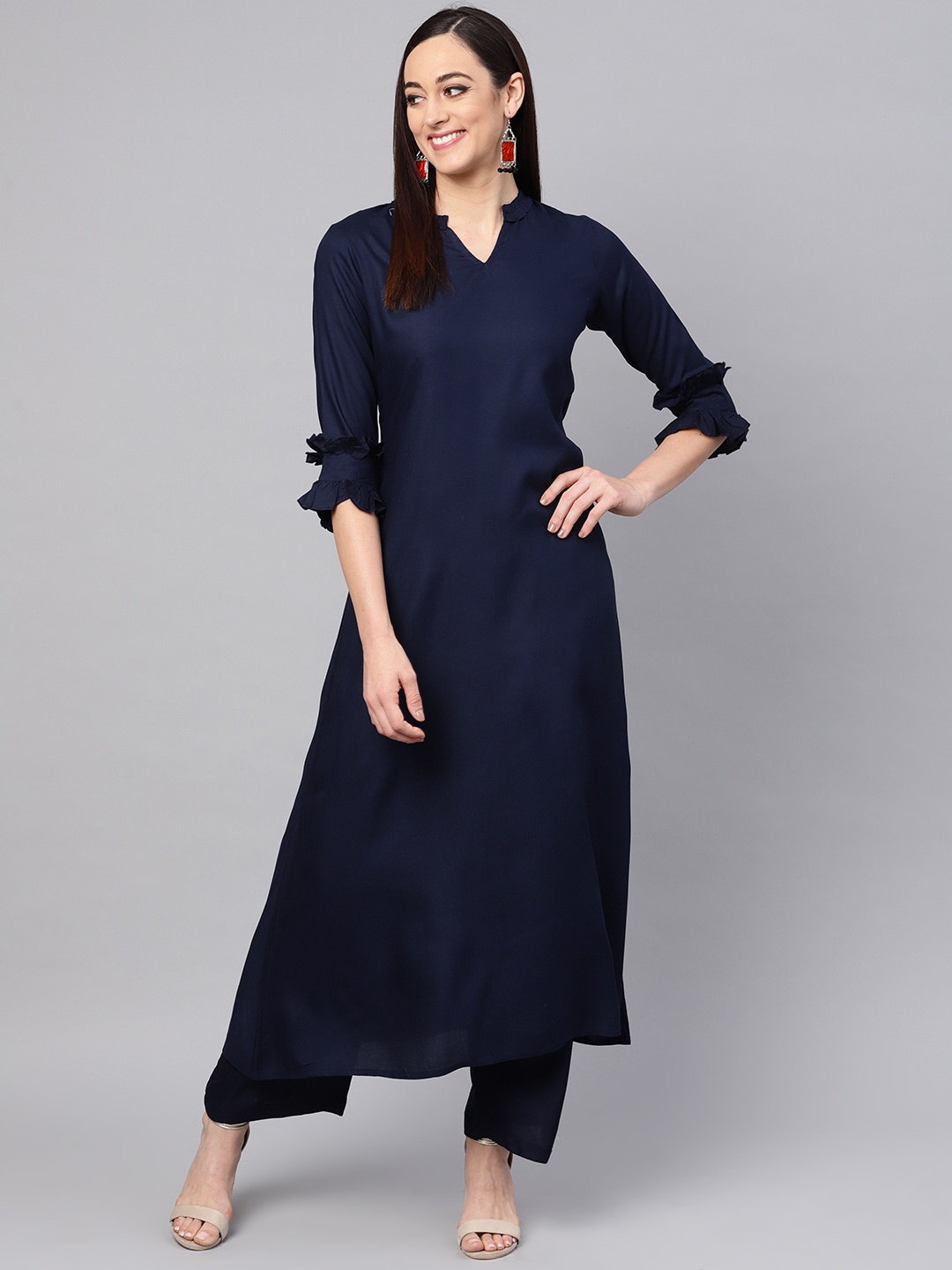 

Idalia Women Navy Blue Solid Kurta with Palazzos