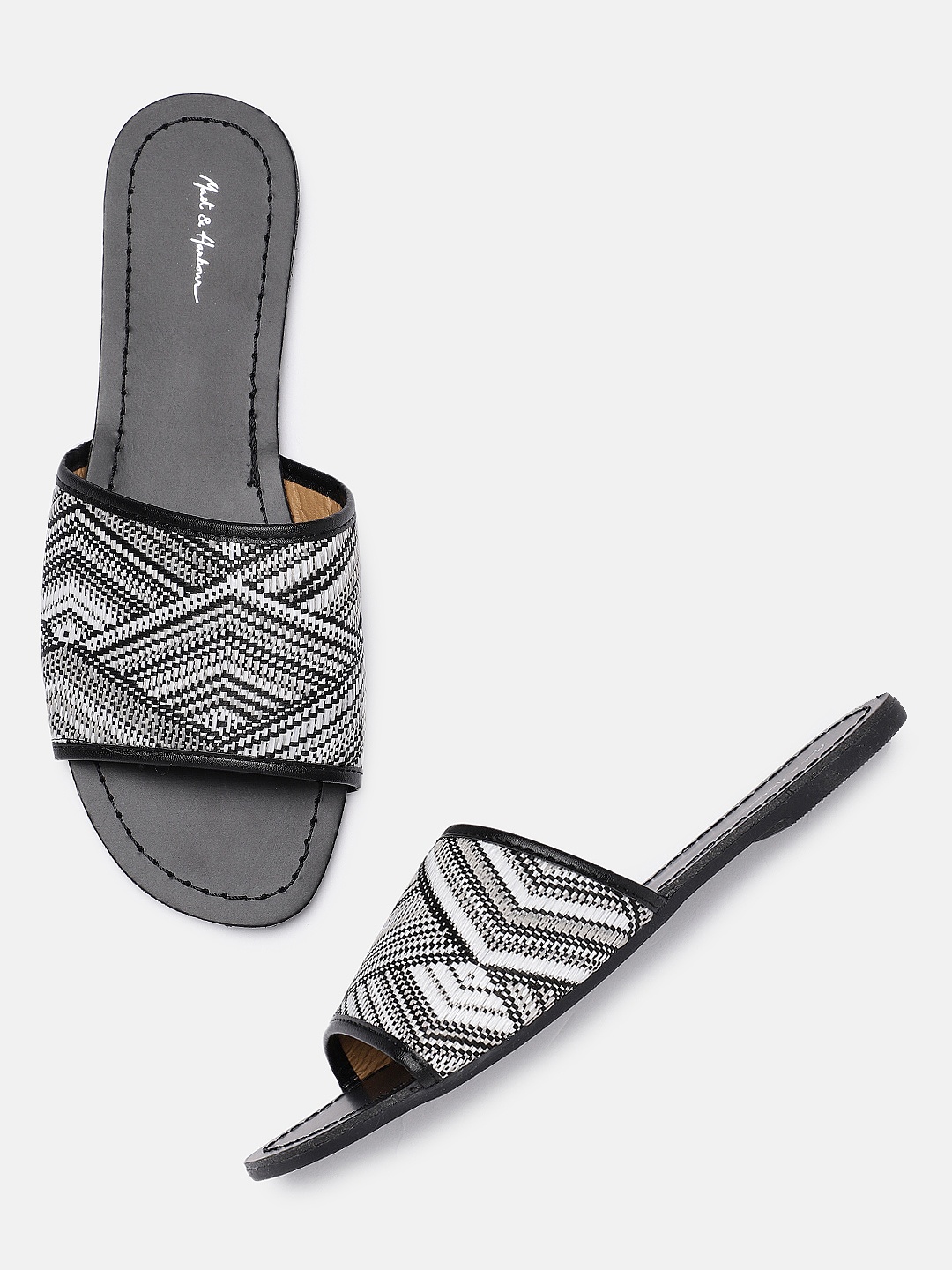 

Mast & Harbour Women Black & White Woven Design Open Toe Flats
