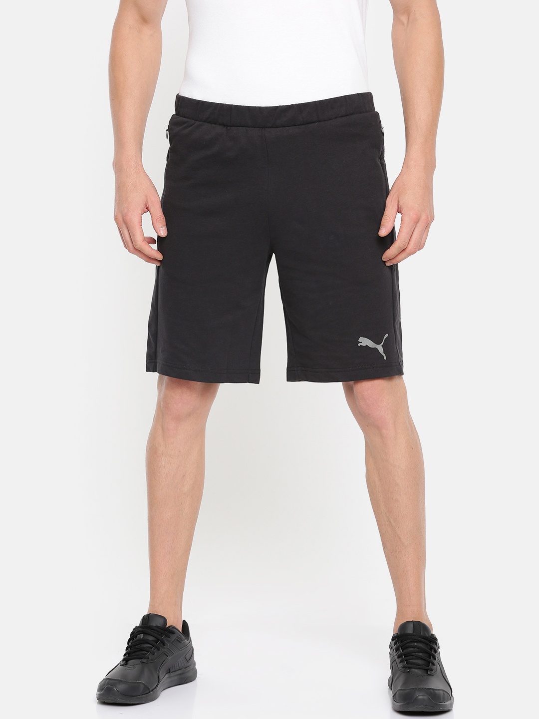 

Puma Men Black Solid Evostripe SpaceKnit DRY-CELL Regular Fit Sports Shorts