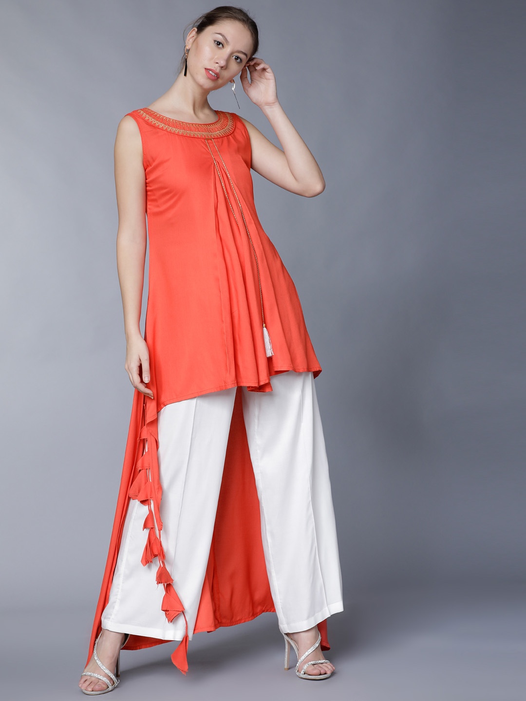 

Vishudh Women Coral Orange & White Solid Kurta with Trousers