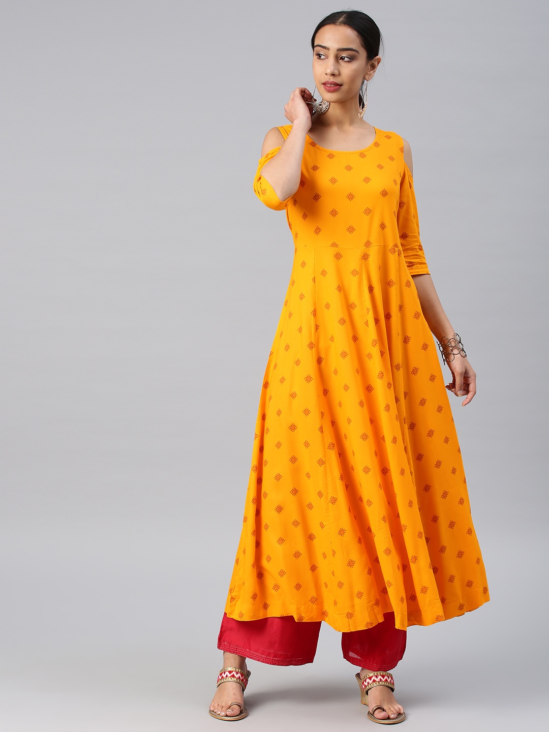 

Vishudh Women Yellow Printed Anarkali Kurta