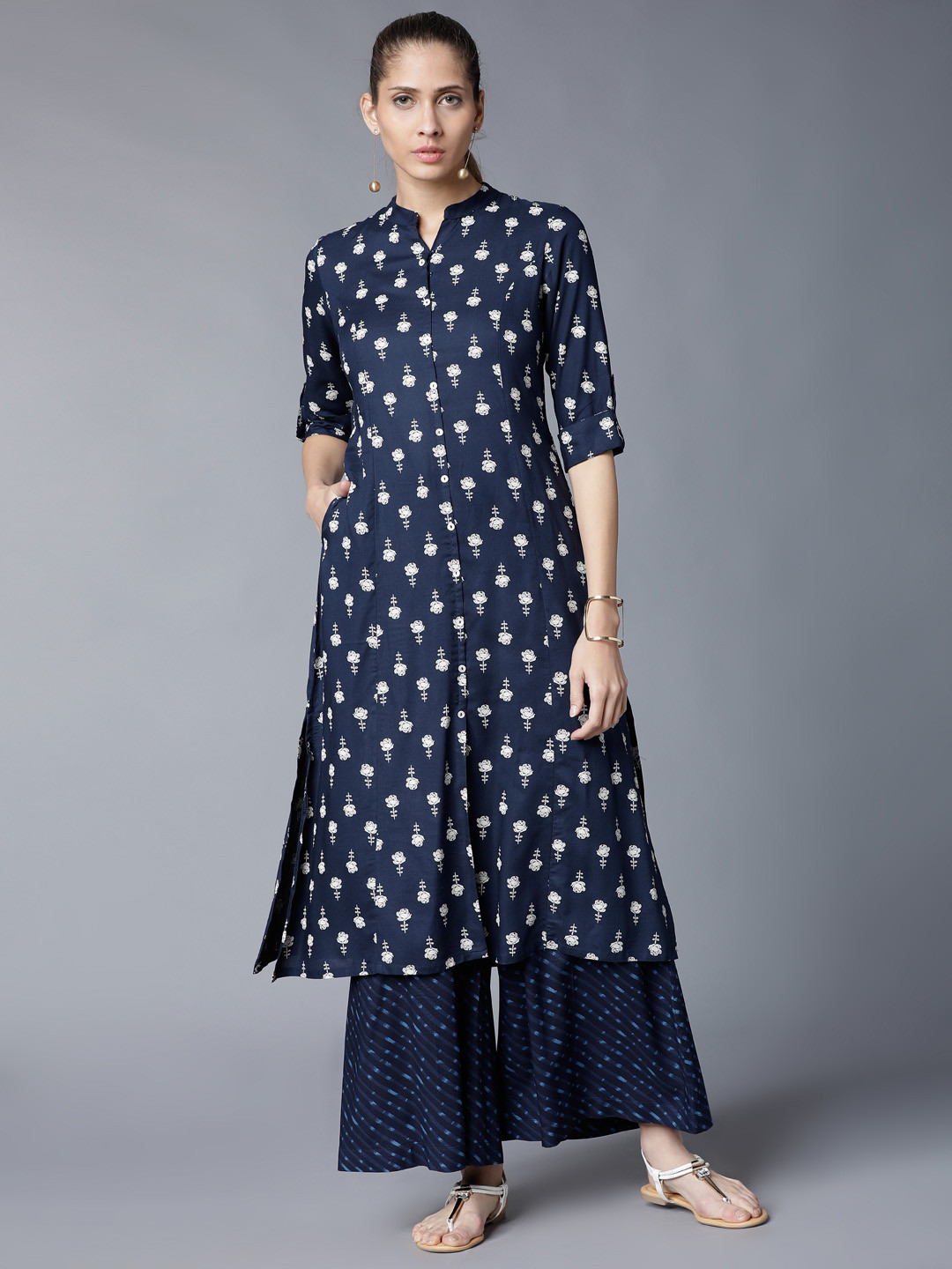 

Vishudh Women Navy Blue Printed Kurta with Palazzos