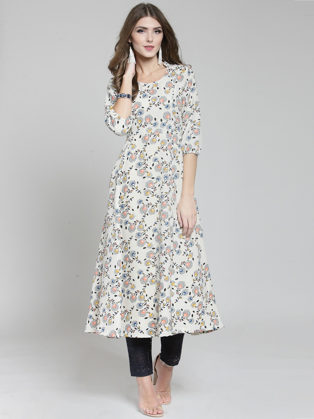 

Sera Women Off-White & Black Printed Kurta with Palazzos