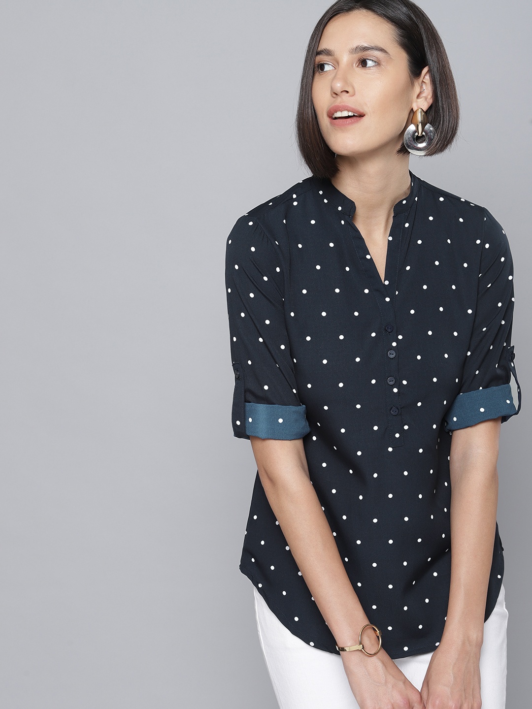 

Tokyo Talkies Navy Blue Polka Dots Roll-Up Sleeves Shirt Style Top