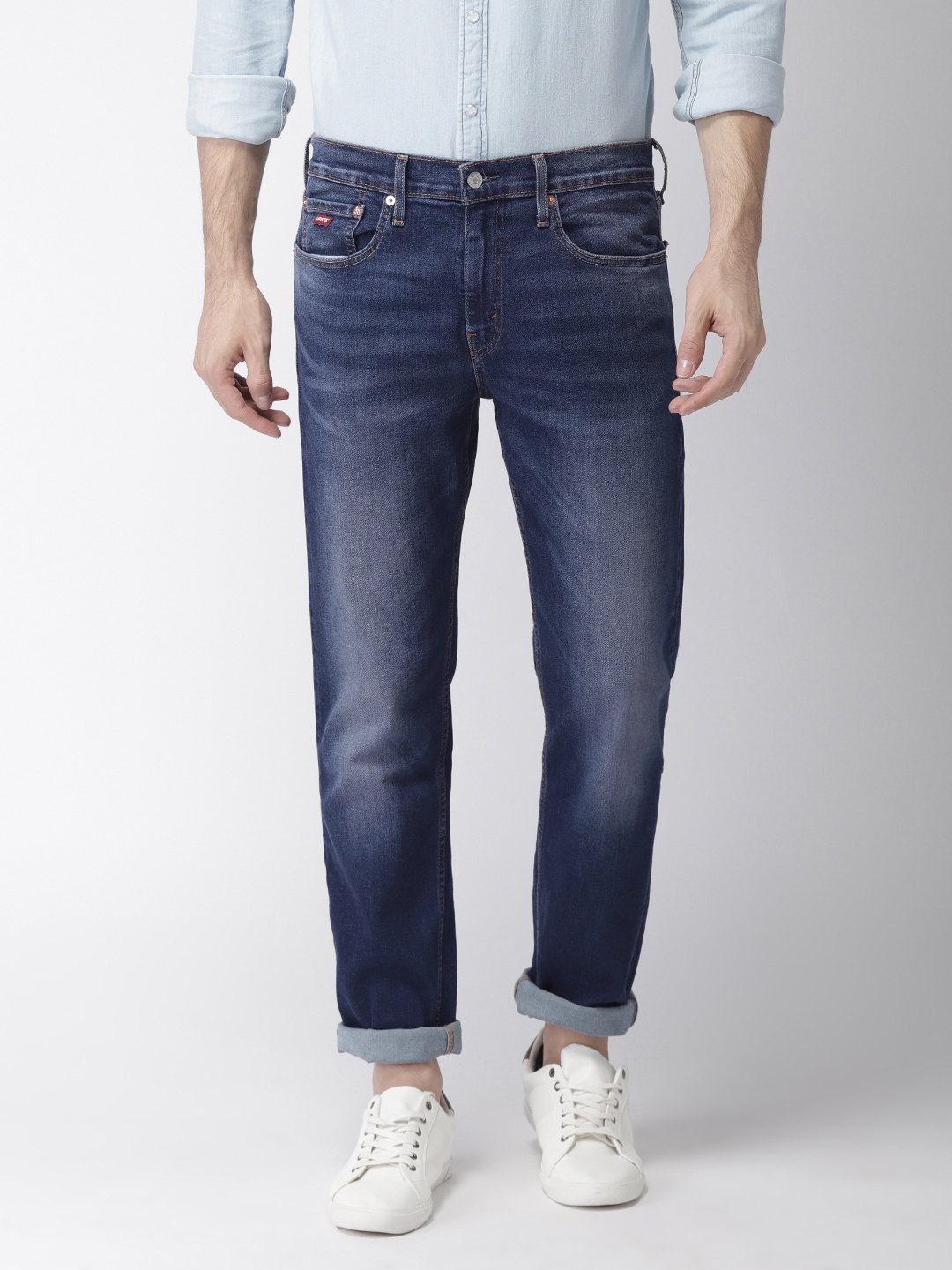 

Levis Men Blue Tapered Fit Mid-Rise Clean Look Stretchable Jeans 502