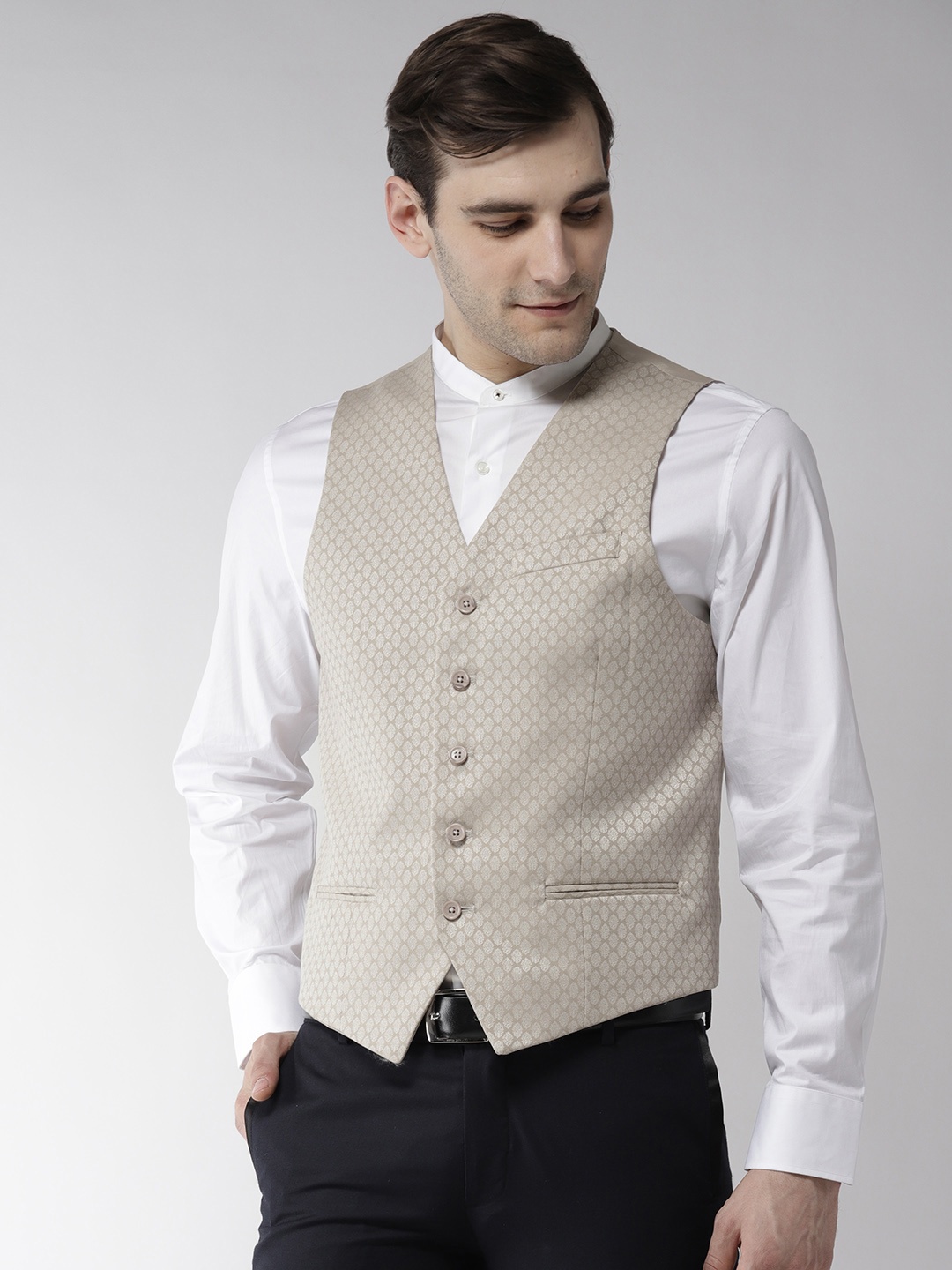 

Arrow Men Beige Woven Design Zero Calorie Fit Waistcoat