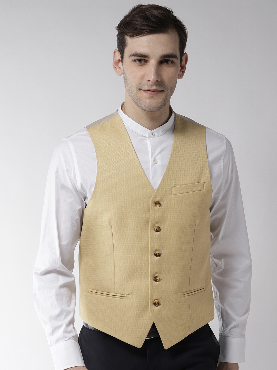 

Arrow Men Beige Self Design Zero Calorie Fit Waistcoat