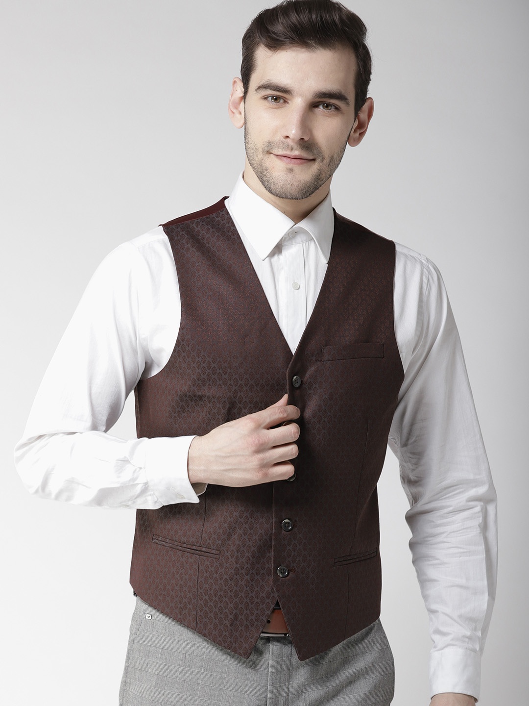 

Arrow Men Burgundy Woven Design Zero Calorie Fit Waistcoat
