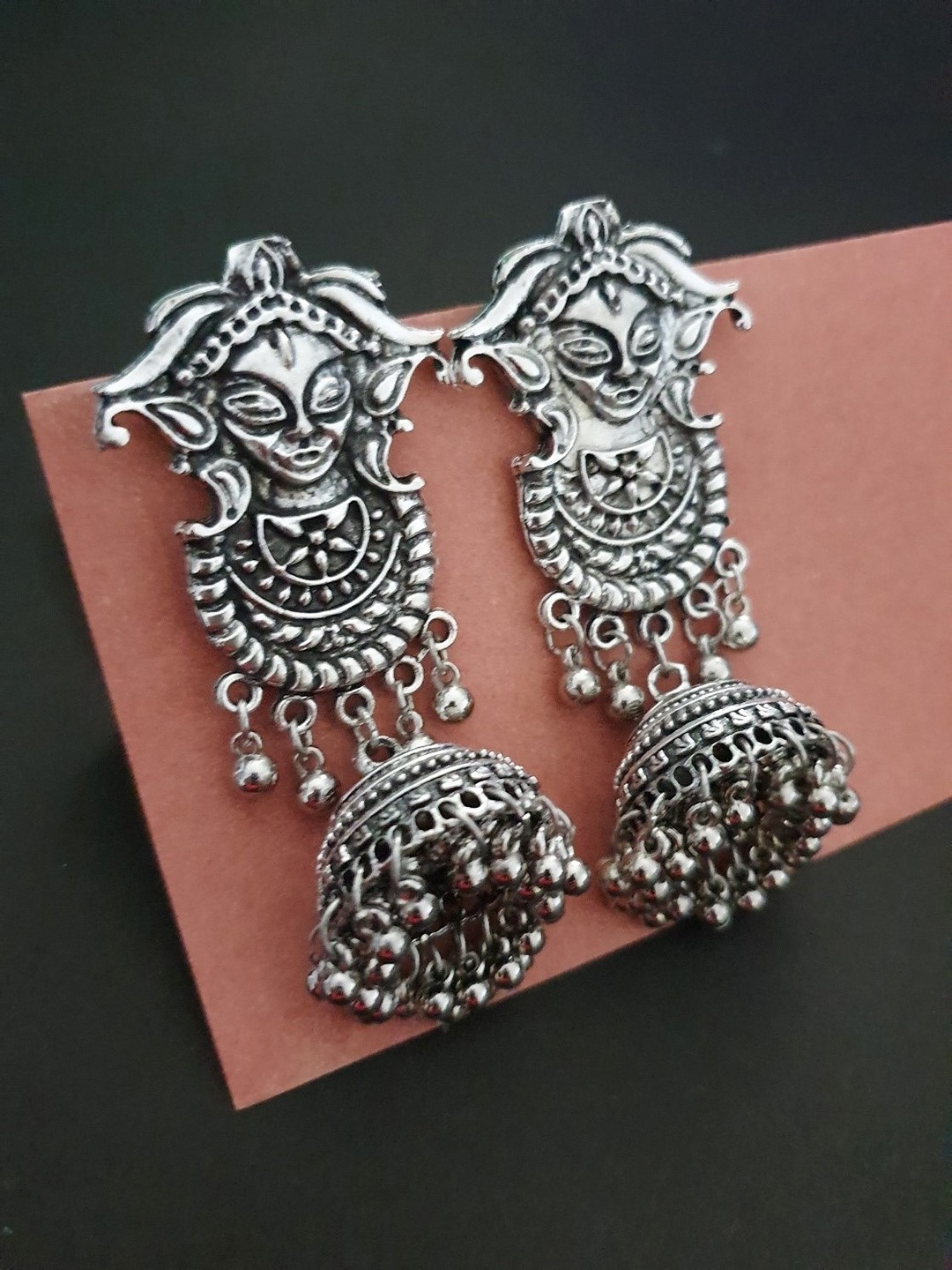 

Infuzze Oxidised Silver-Toned Goddess Textured Dome Shaped Jhumkas
