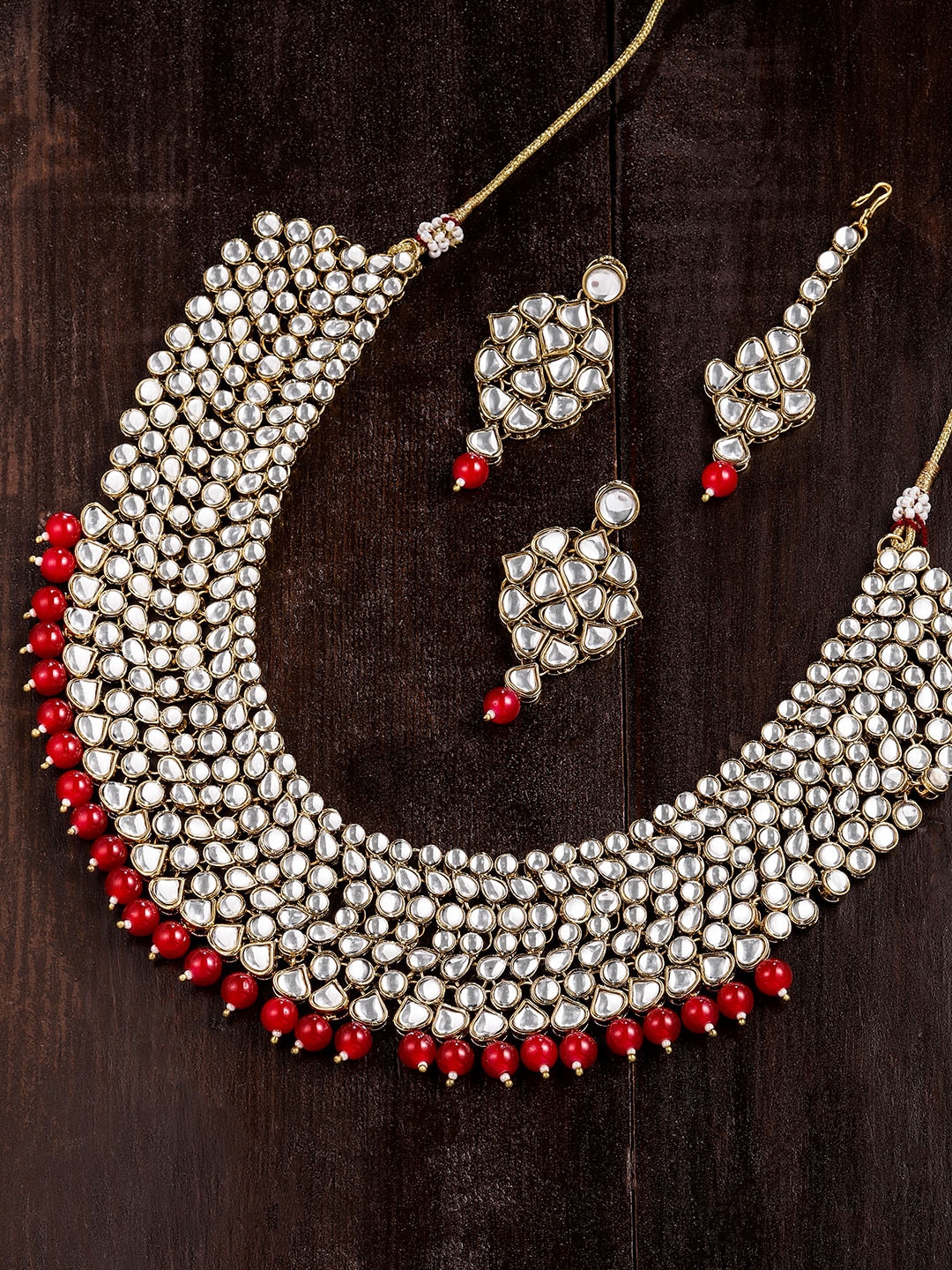 

Zaveri Pearls Gold-Toned & Red Kundan & Dangling Beads Jewellery Set