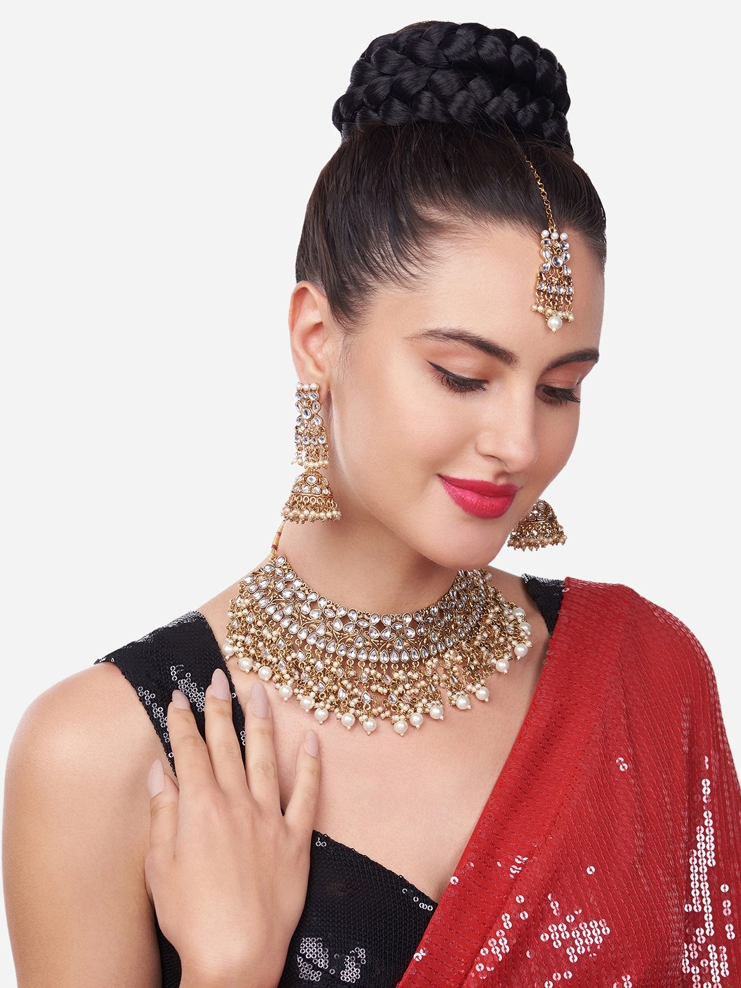 

Zaveri Pearls Gold-Toned Traditional Kundan & Pearls Studded Jewellery Set