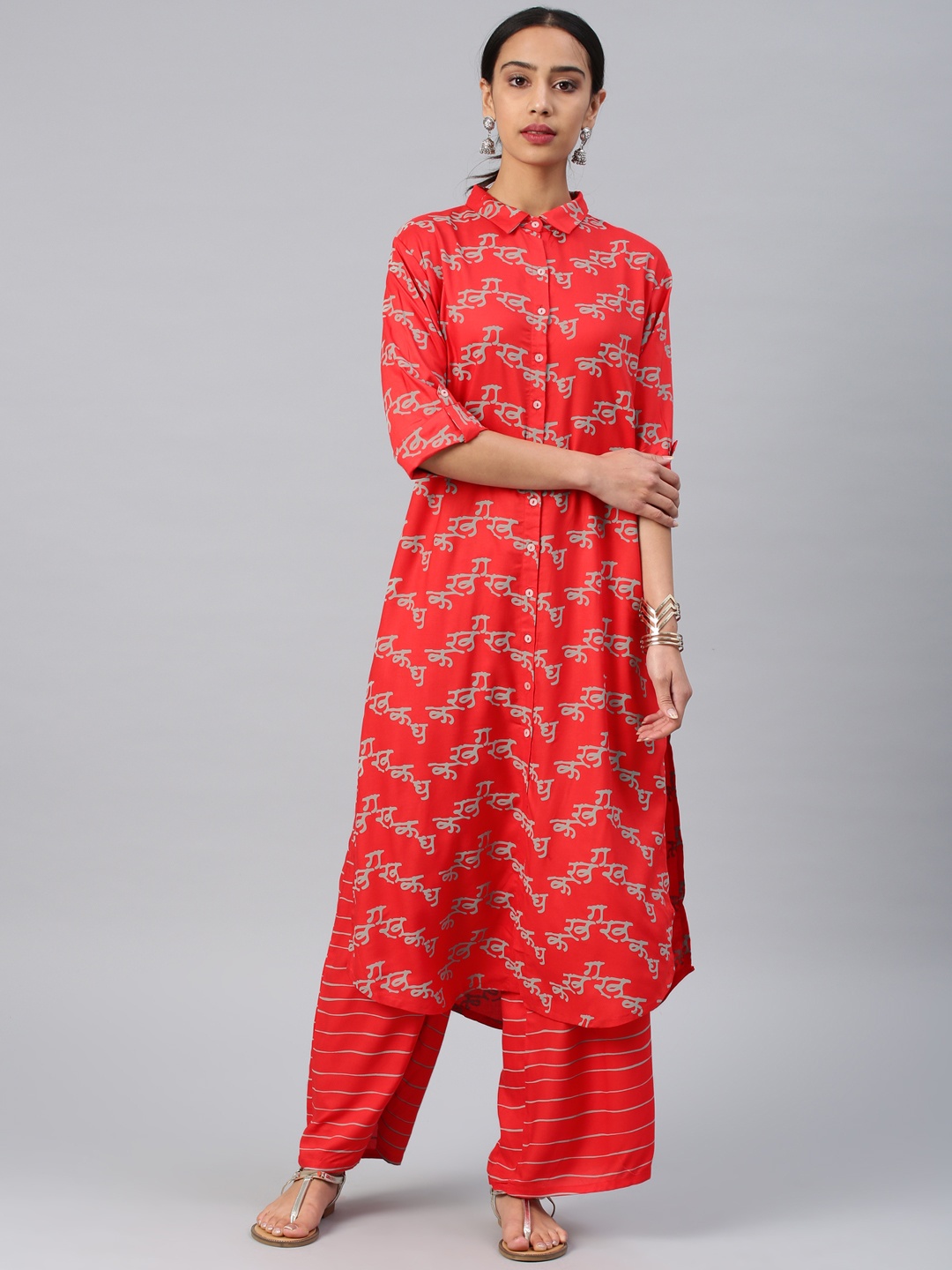 

Vishudh Women Orange & Grey Printed Kurta with Palazzos