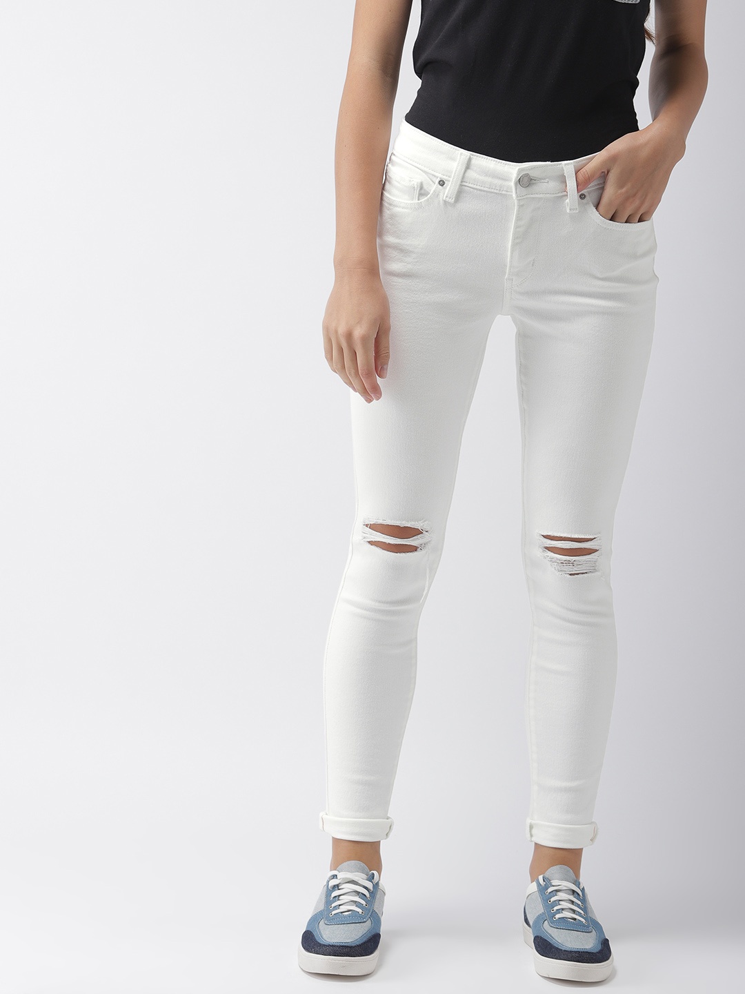 

Levis Women White Skinny Fit Mid-Rise Slash Knee Stretchable Jeans 711