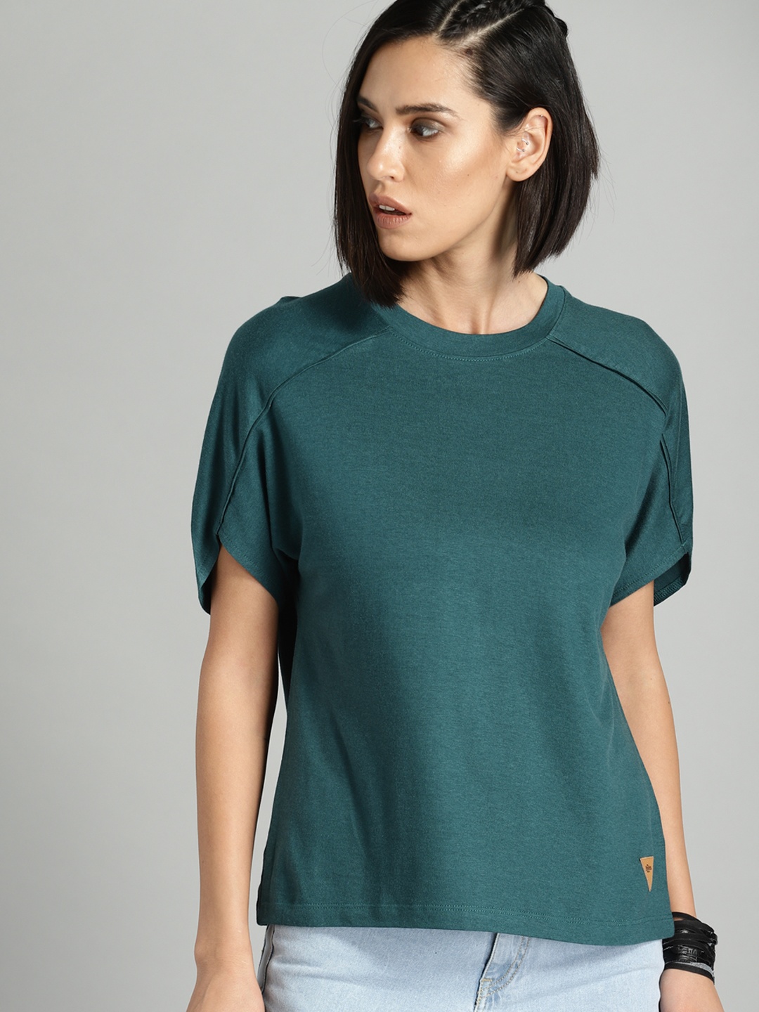 

Roadster Women Teal Blue Solid Round Neck T-shirt