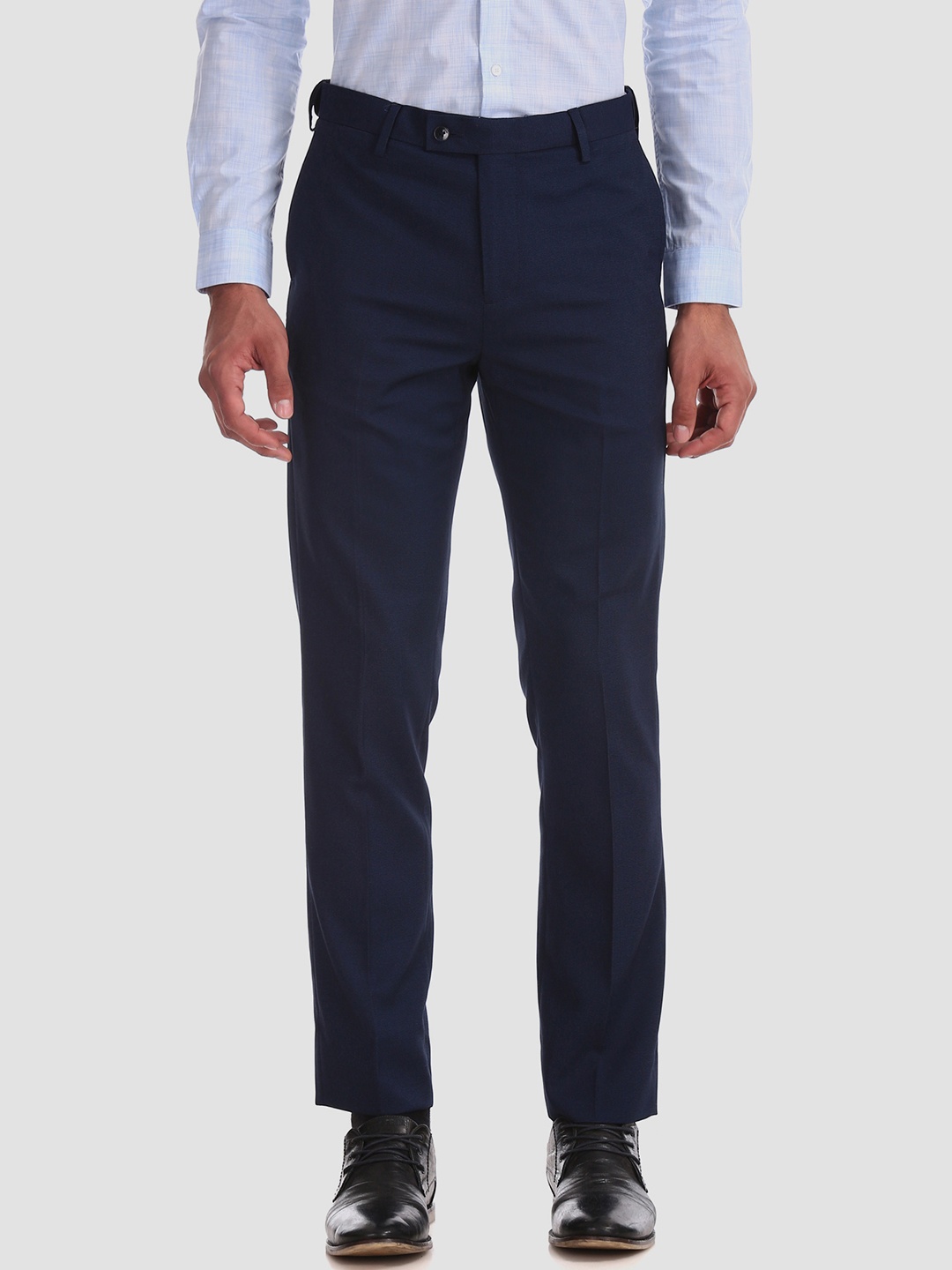 

Arrow Men Navy Blue Tapered Fit Solid Formal Trousers
