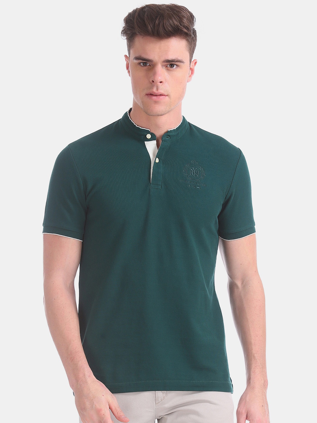 

Arrow Sport Men Green Solid Henley Neck Pure Cotton T-shirt