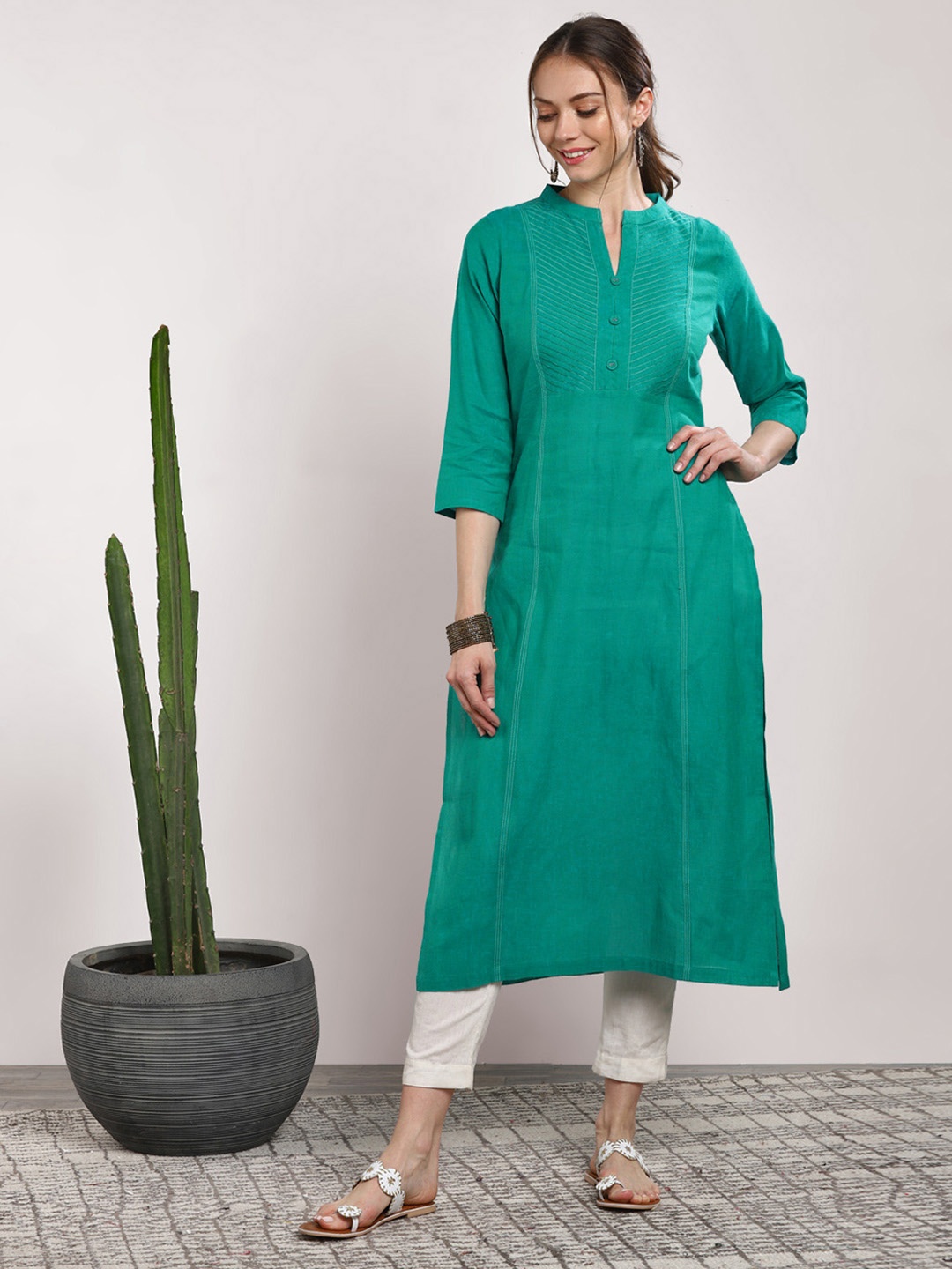 

Sangria Women Teal Solid Straight Kurta