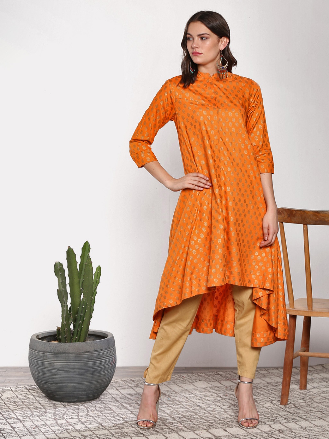 

Sangria Women Orange & Golden Printed A-Line Kurta