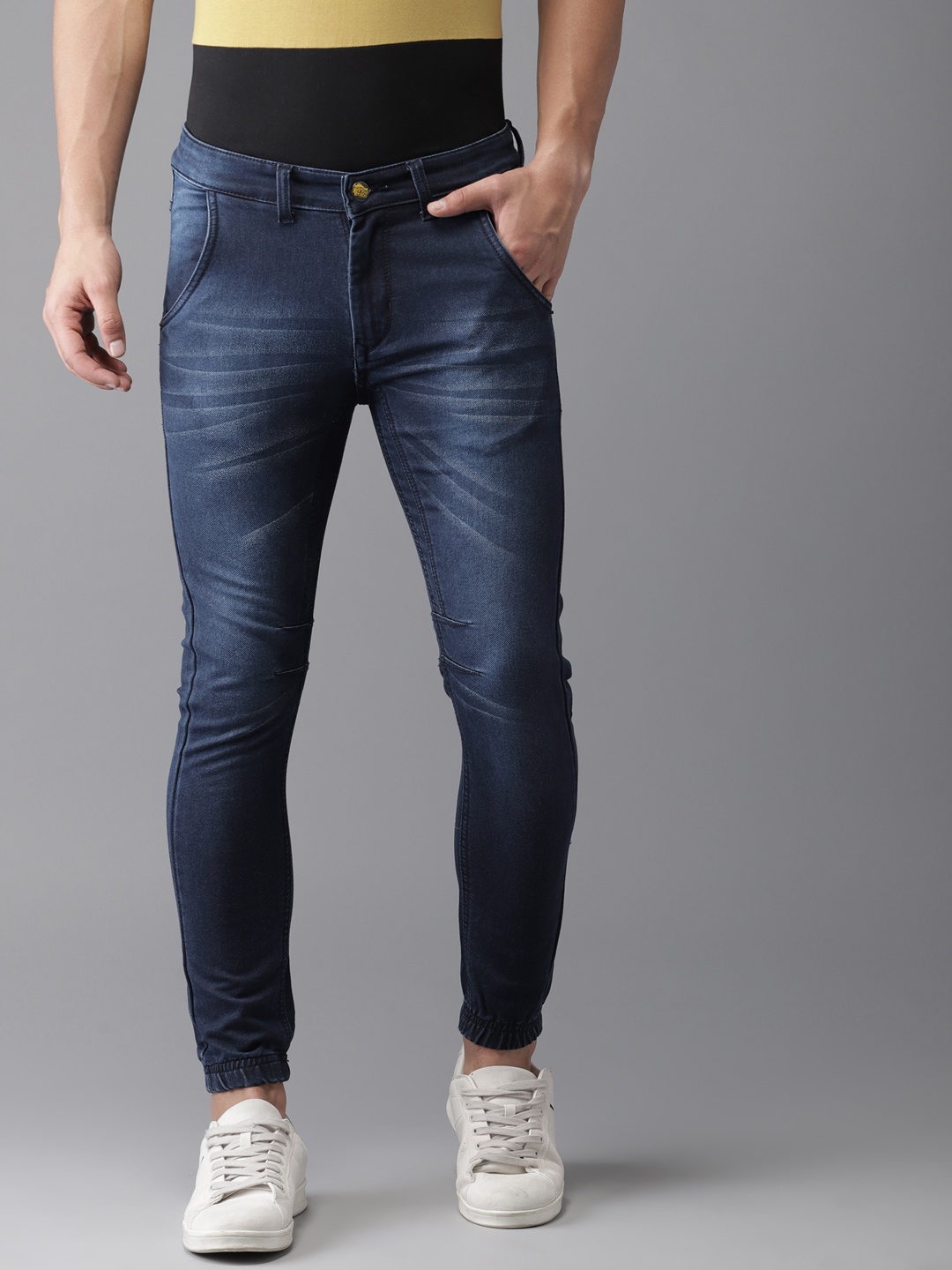 

Campus Sutra Men Blue Jogger Fit Mid-Rise Clean Look Stretchable Jeans