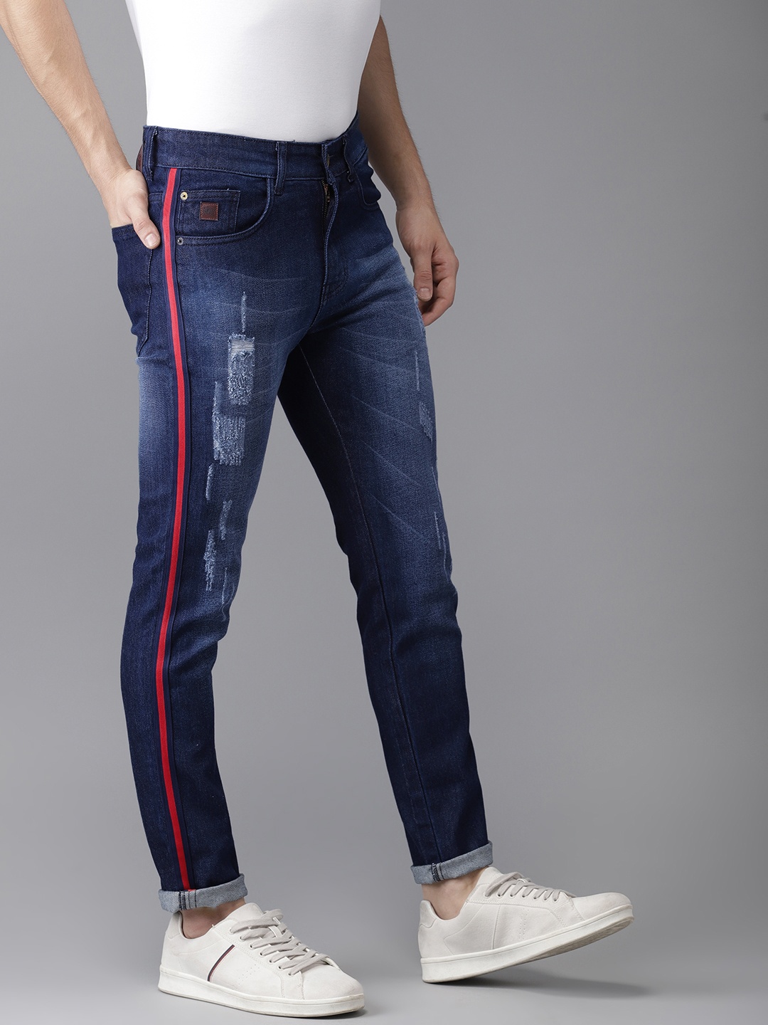 

Campus Sutra Men Blue Slim Fit Mid-Rise Dark Shaded Side Red Stripe Stitching Denim Jeans