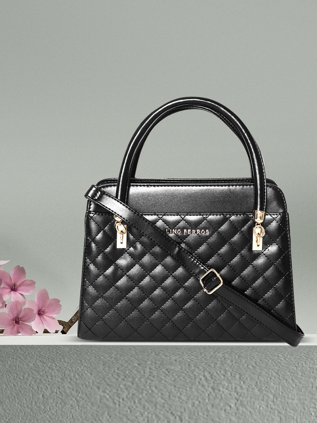

Lino Perros Black Quilted Handheld Bag