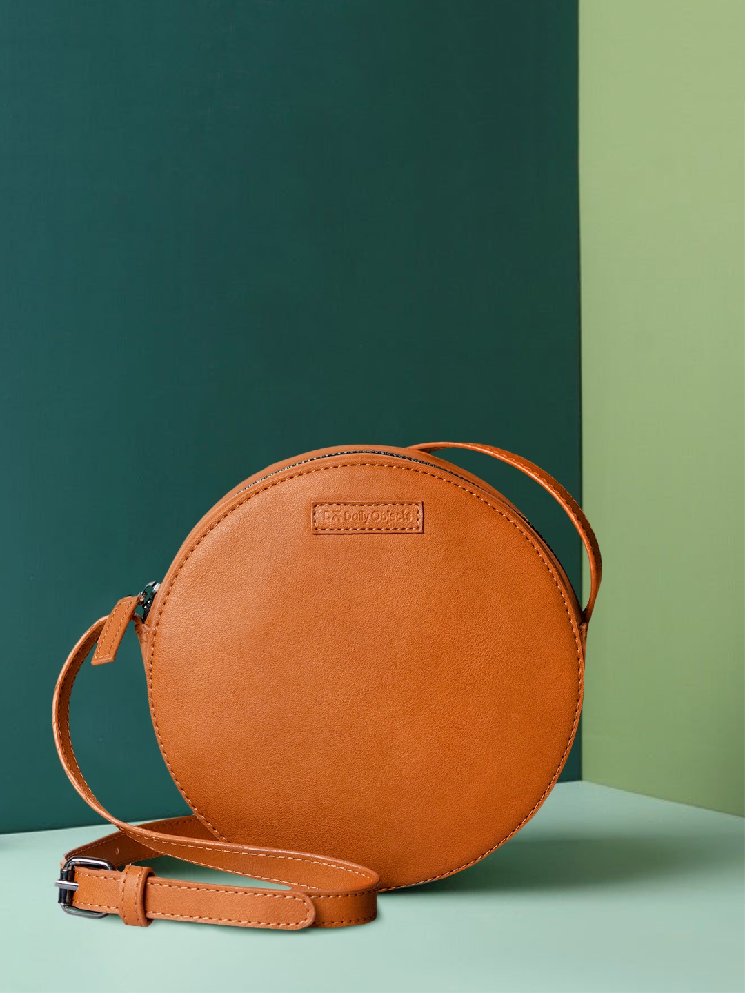 

DailyObjects Tan Solid Sling Bag