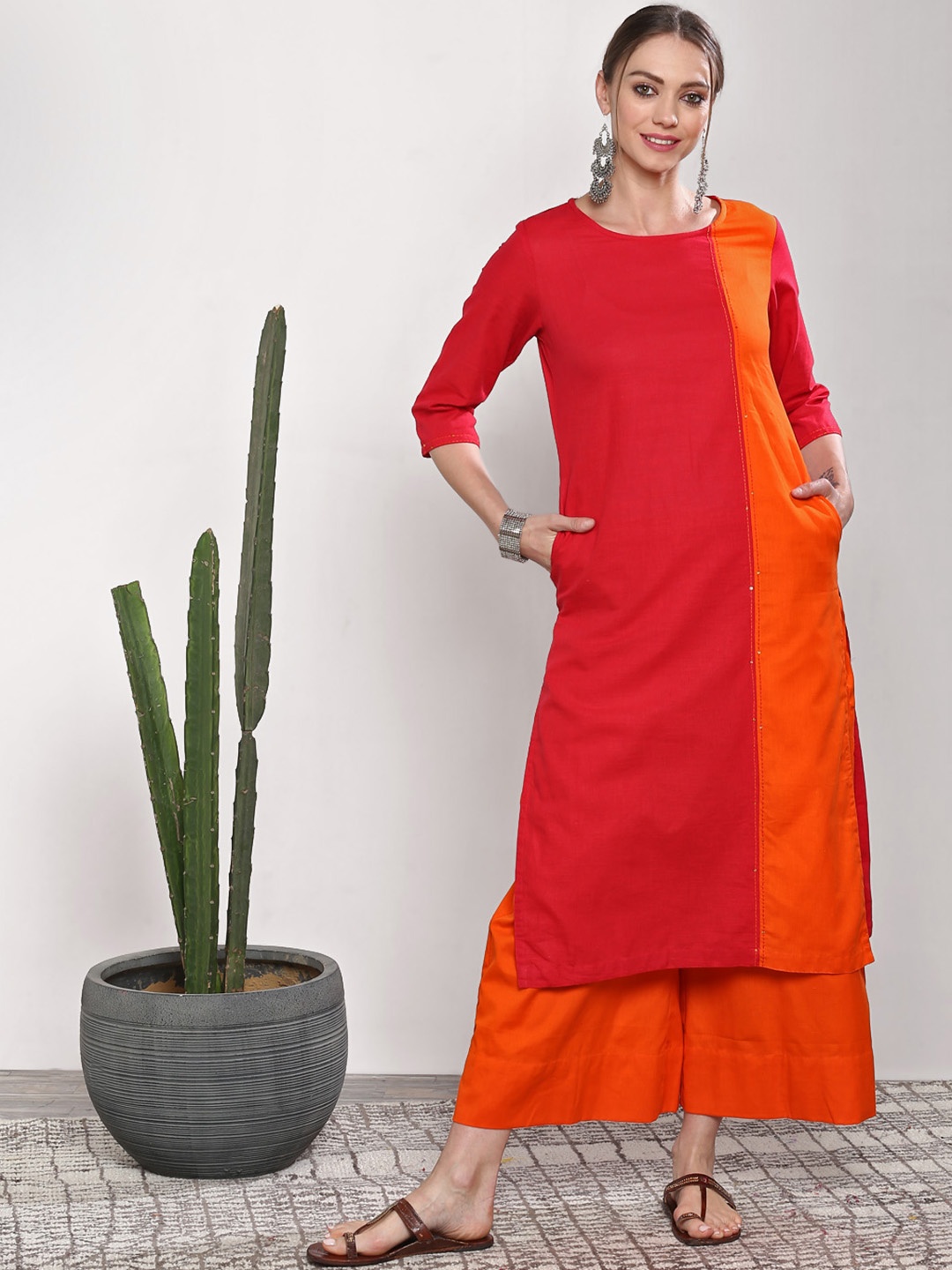 

Sangria Women Red & Orange Colourblocked Kurta with Palazzos