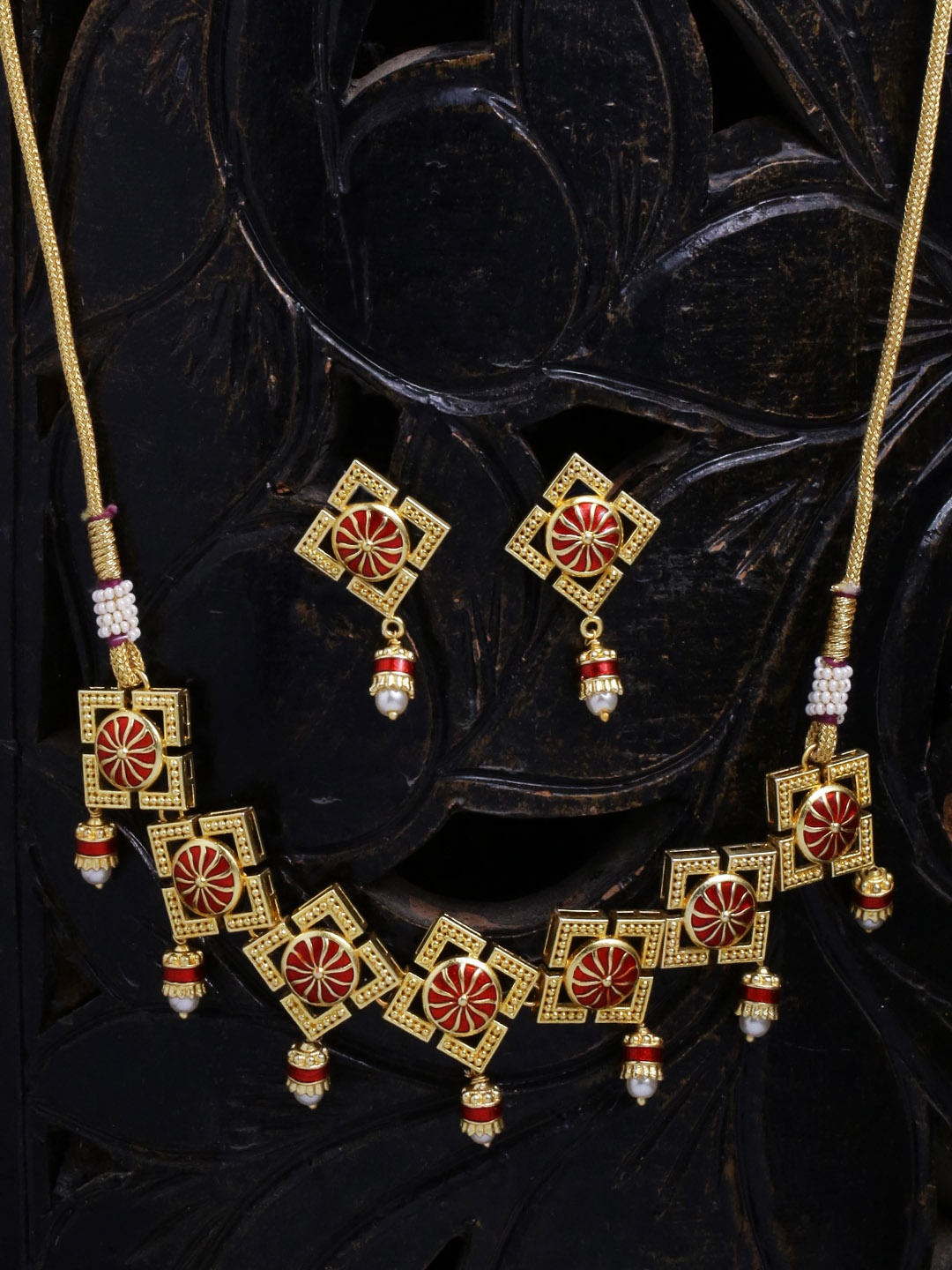 

Voylla Women Gold-Toned & Red Engraved Jewellery Set