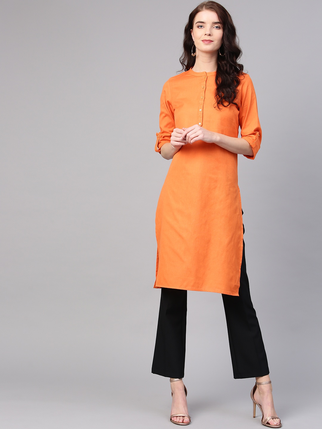

W Women Orange Solid Straight Kurta