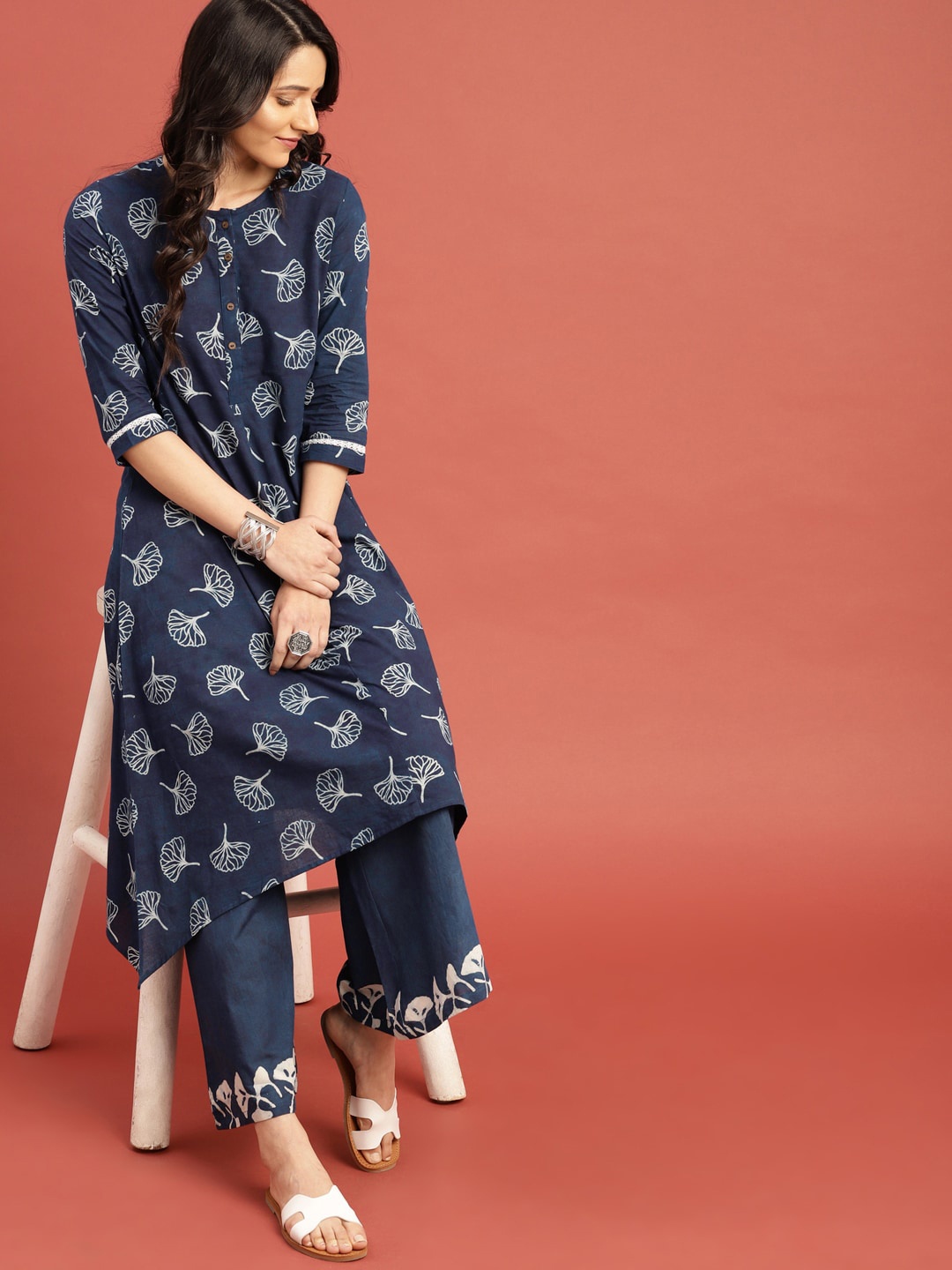 

Taavi Women Blue Indigo A-Line Asymmetric Sustainable Kurta with Palazzos
