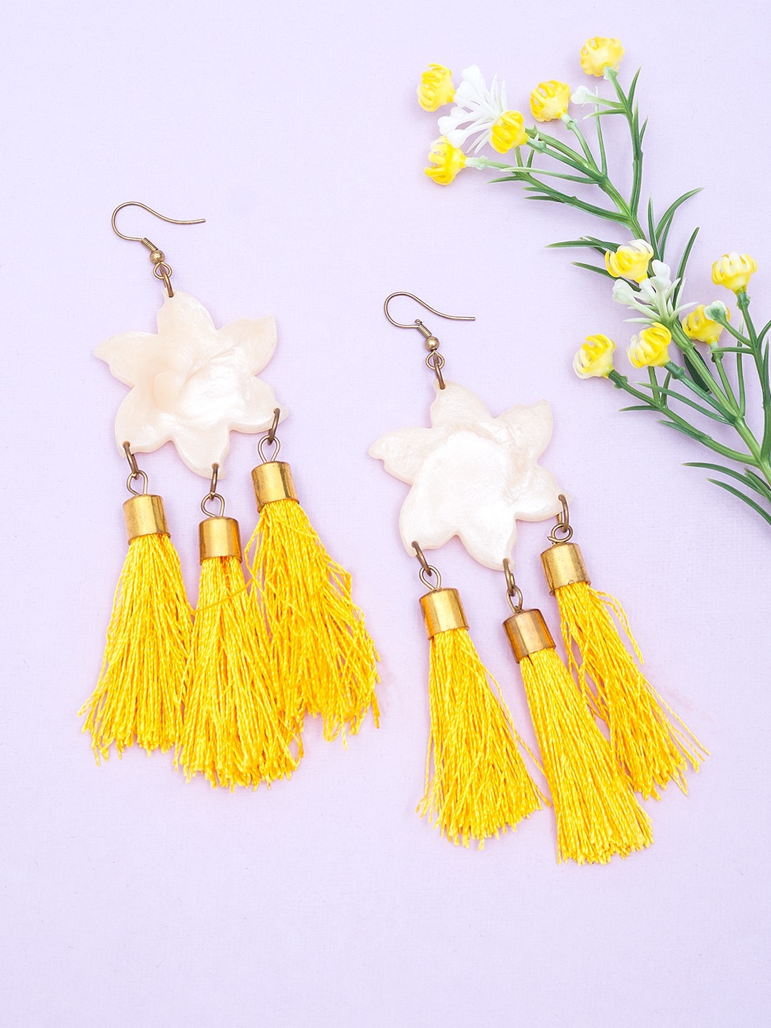 

Golden Peacock Yellow Star Shaped Drop Earrings