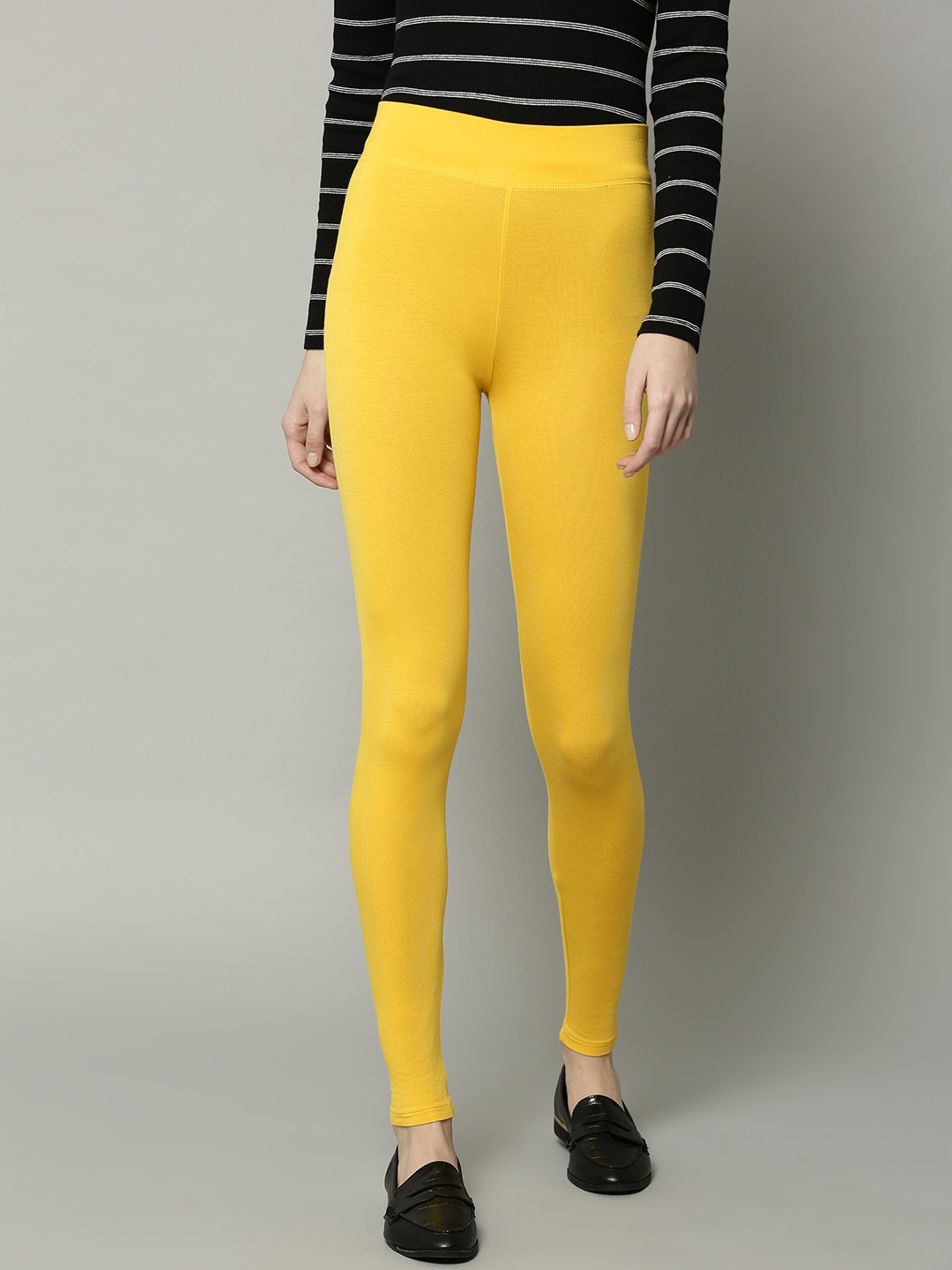

Marks & Spencer Women Yellow Solid Leggings
