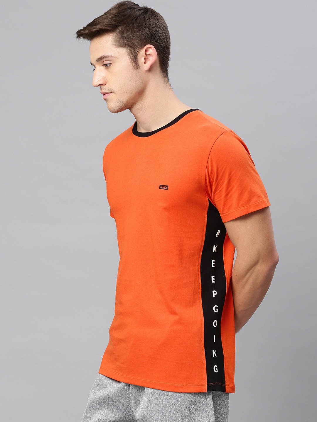 

HRX by Hrithik Roshan Men Orange Solid Lifestyle Crew Neck Pure Cotton T-shirt