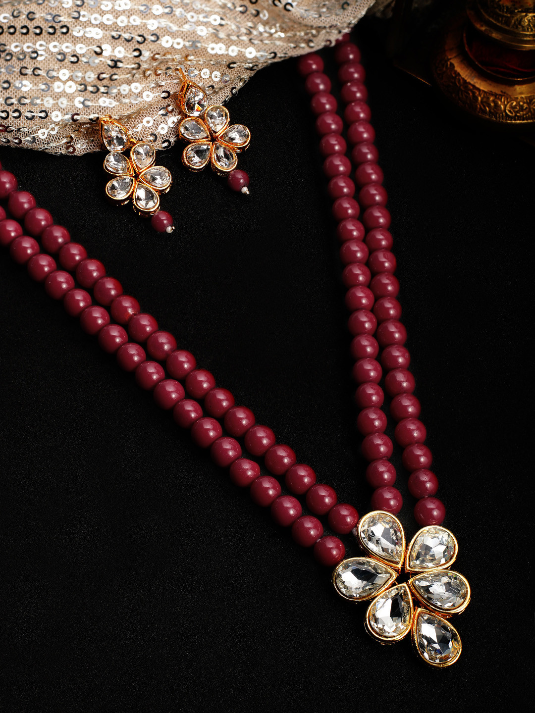 

Rubans Gold Plated Ruby Embellished Kundan Studded Necklace Set