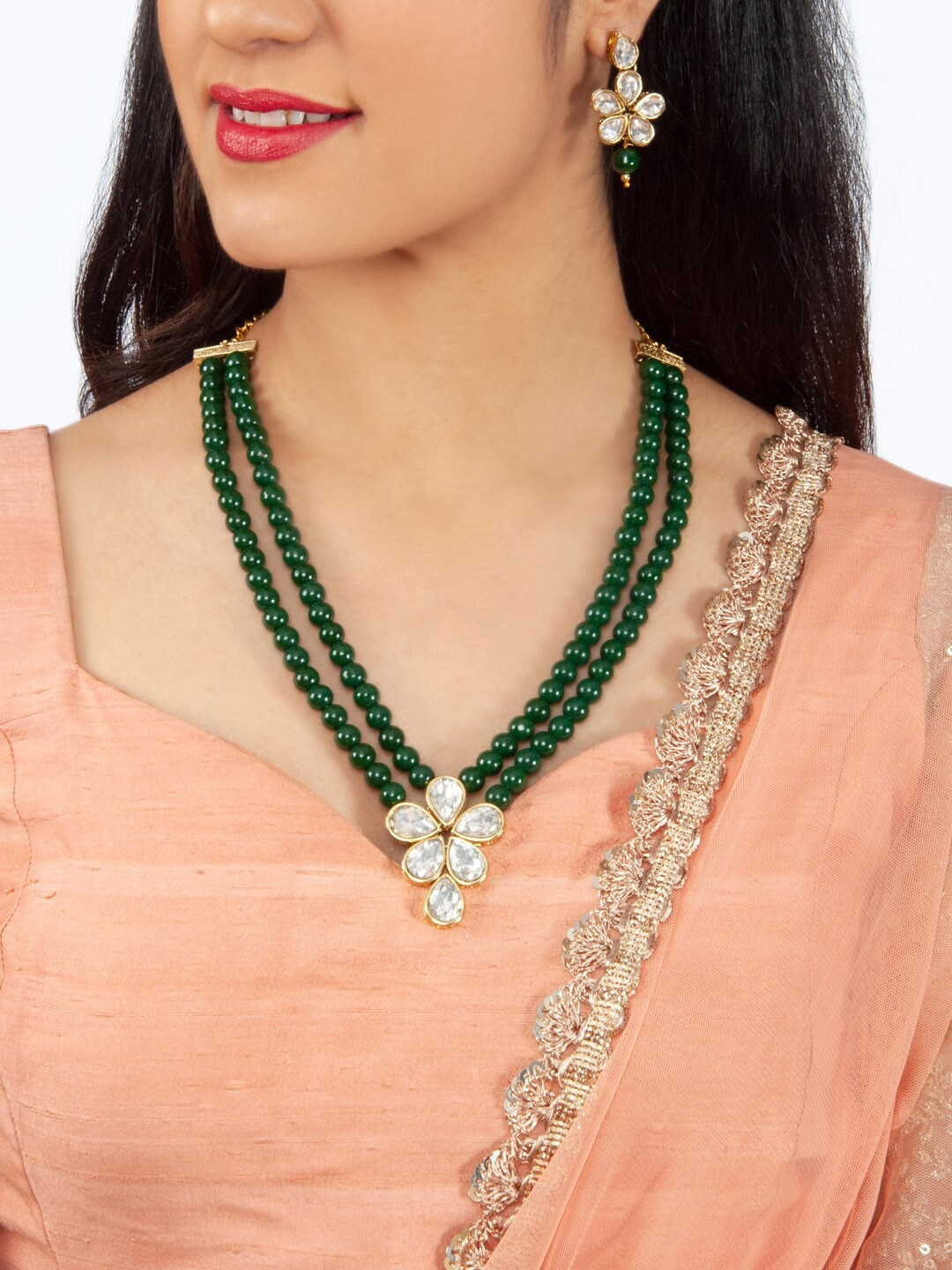 

Rubans Gold Plated Emerald Beads Embellished Kundan Studded Necklace Set