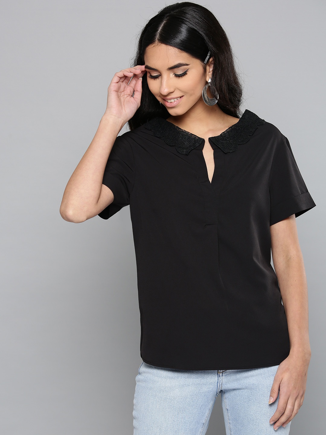 

Harpa Women Black Solid Top