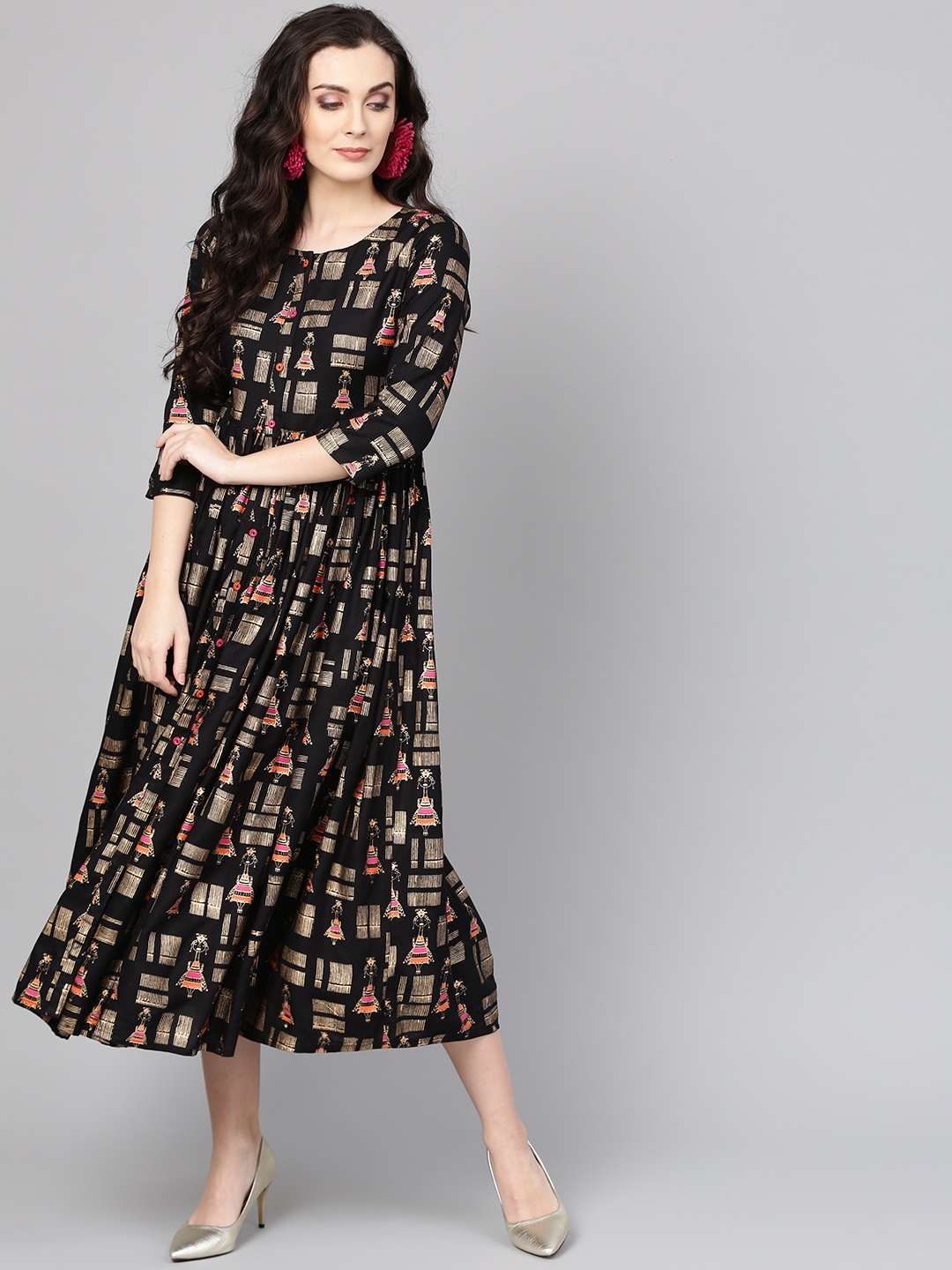 

Varanga Black Quirky Print Empire Dress