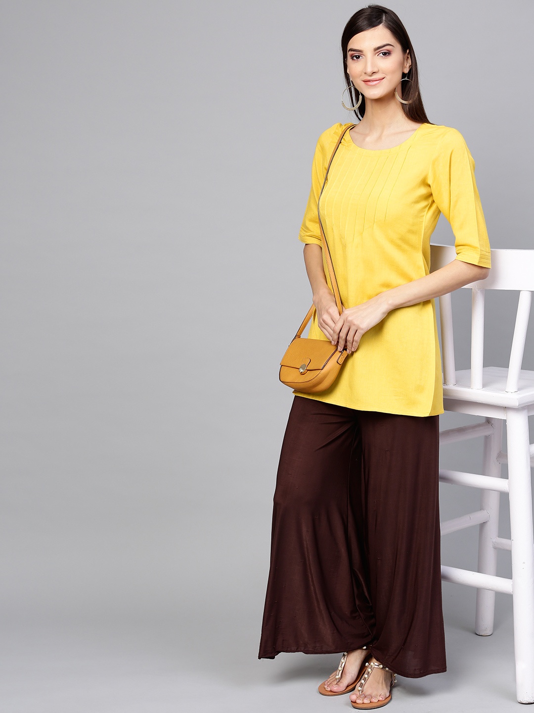 

Gerua By Libas Women Mustard Yellow Solid Straight Kurti