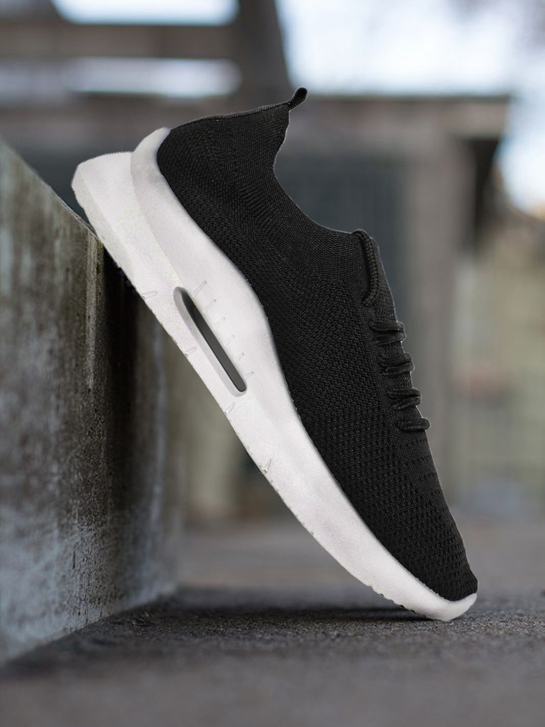 

Roadster Women Black Sneakers