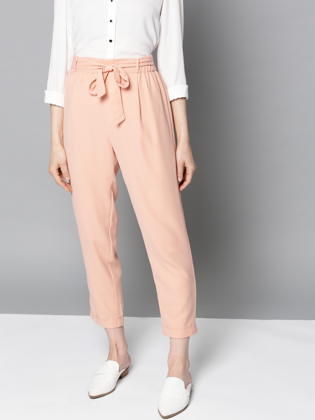 

Besiva Women Peach-Coloured Regular Fit Solid Trousers